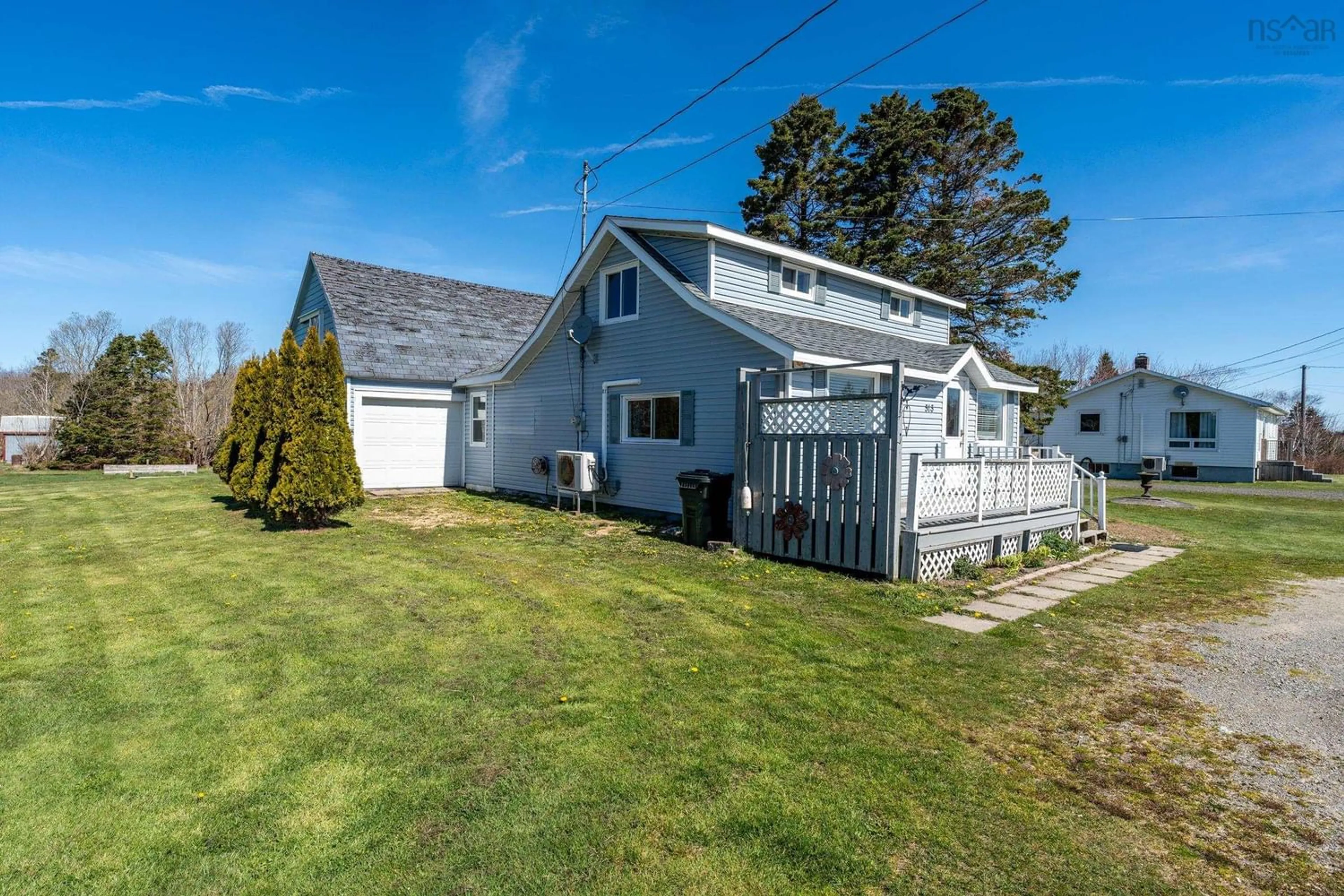 Frontside or backside of a home, the fenced backyard for 513 Saulnierville Road, Saulnierville Nova Scotia B0W 2Z0