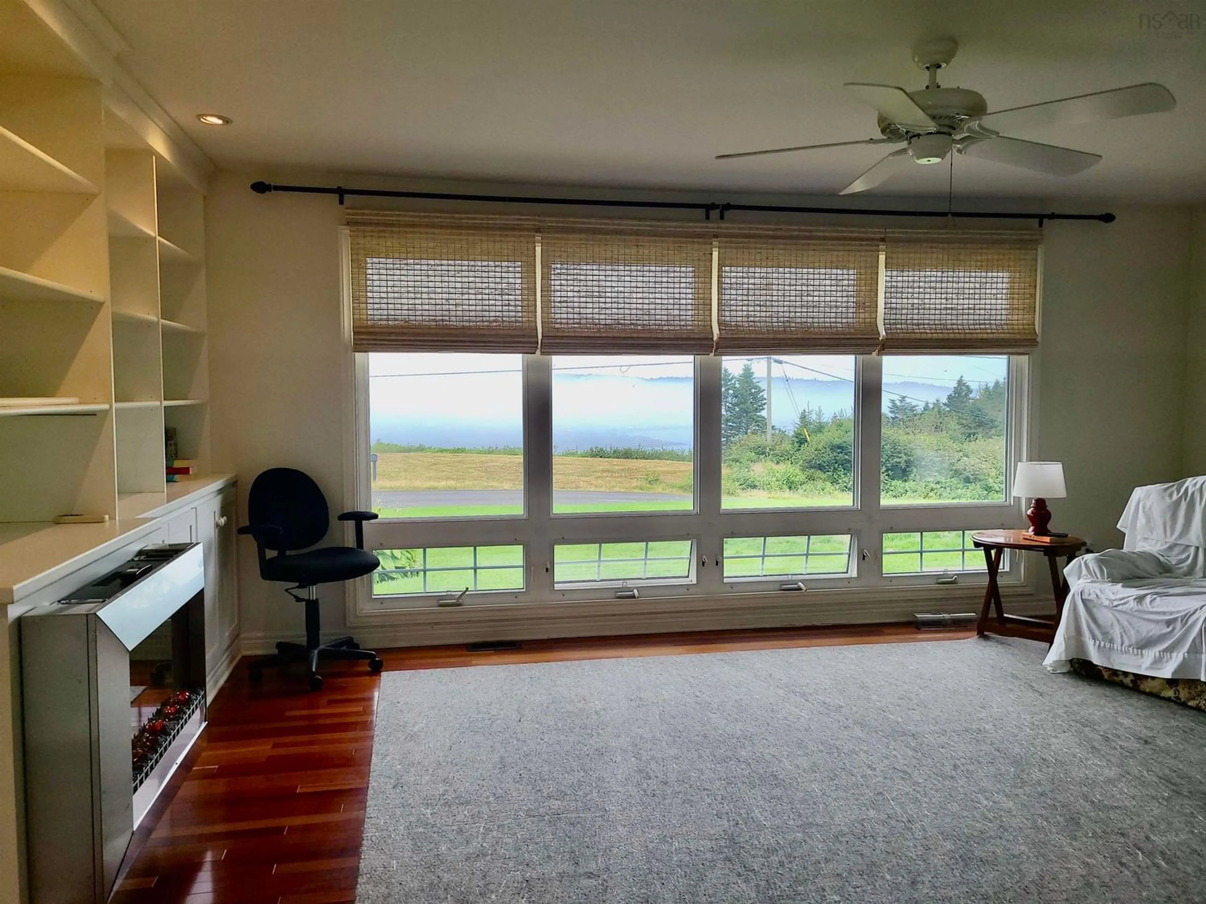 Living room, wood floors for 93 Across The Meadow Rd, East Ferry Nova Scotia B0V 1E0