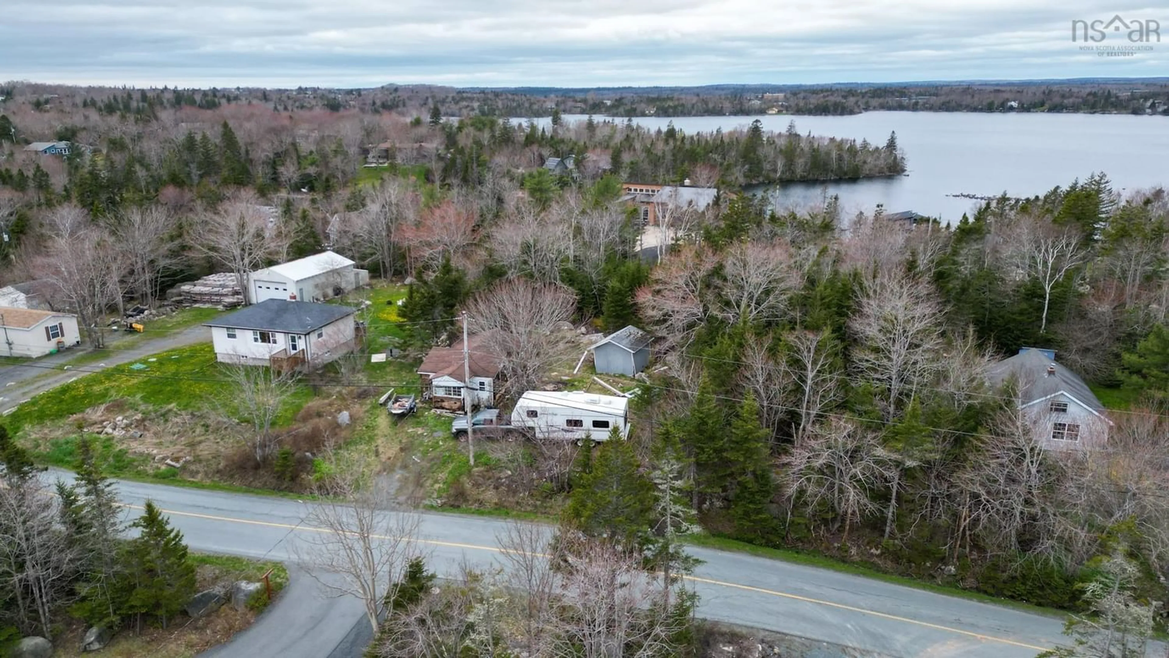 A pic from outside/outdoor area/front of a property/back of a property/a pic from drone, water/lake/river/ocean view for 199 Club Rd, Hatchet Lake Nova Scotia B3T 1R2