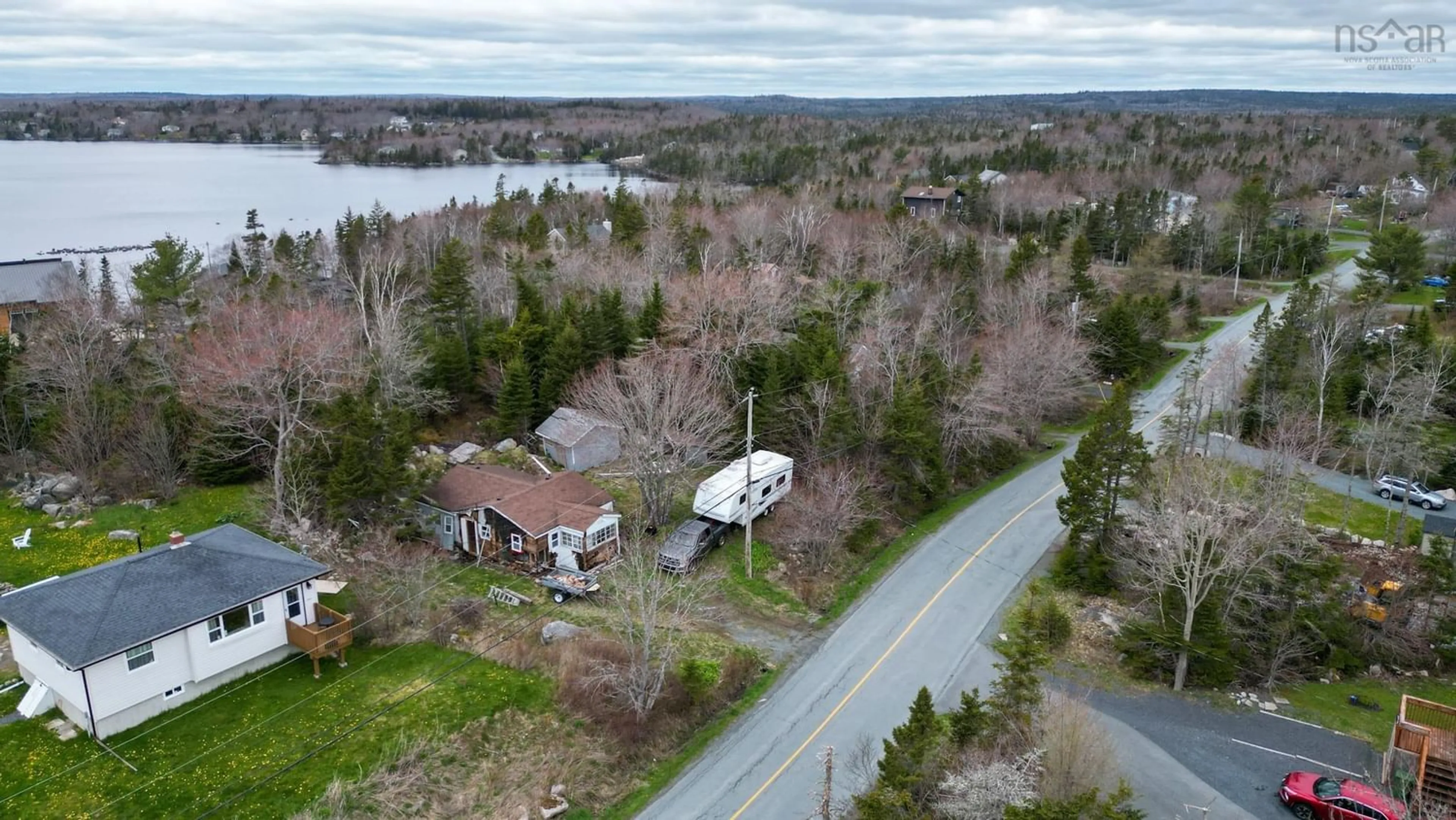 A pic from outside/outdoor area/front of a property/back of a property/a pic from drone, water/lake/river/ocean view for 199 Club Rd, Hatchet Lake Nova Scotia B3T 1R2