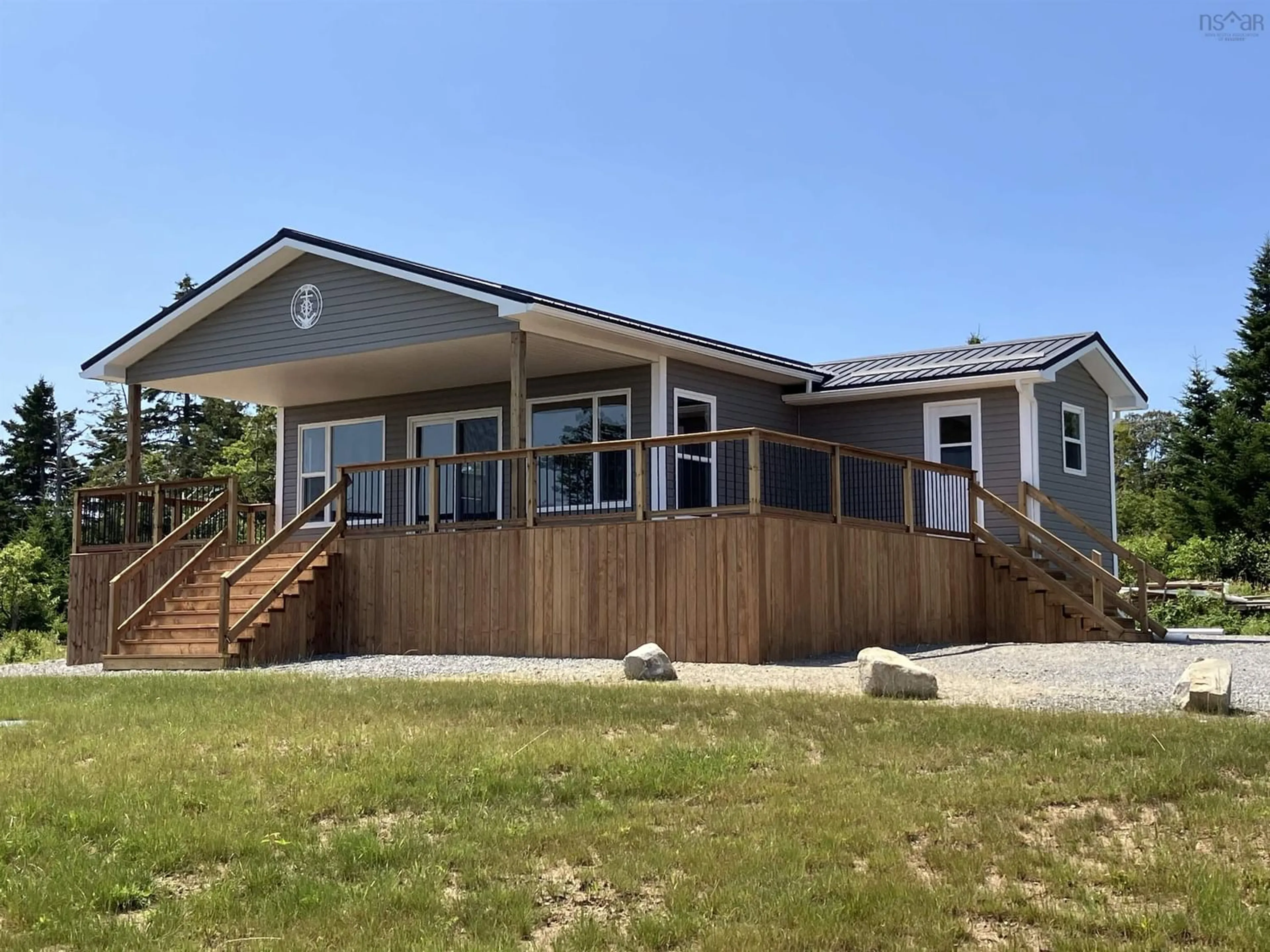 Frontside or backside of a home for 18 Port Rd, Upper Port La Tour Nova Scotia B0W 1E0