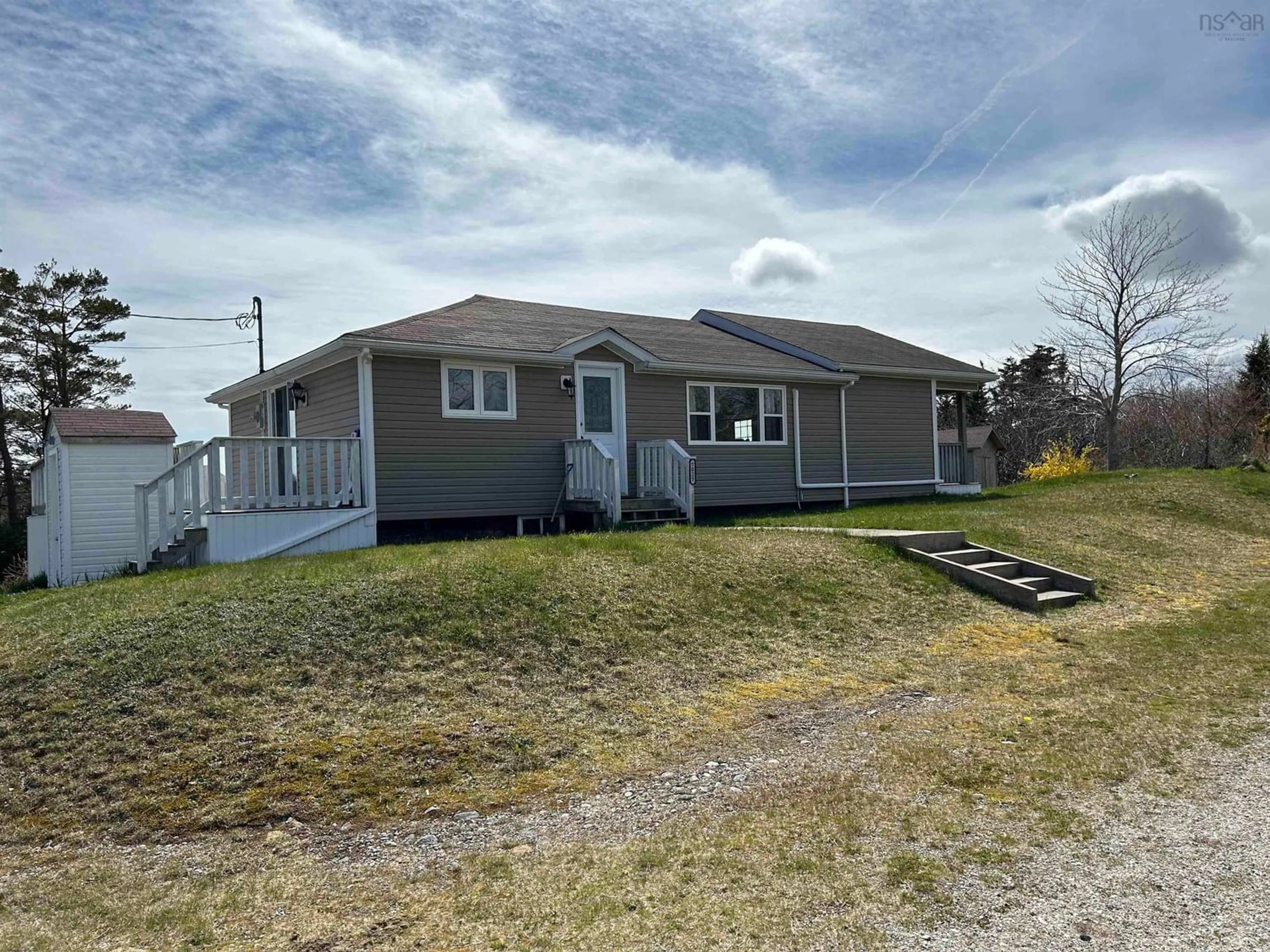 Frontside or backside of a home for 7025 Shore Road, Port Saxon Nova Scotia B0W 1W0