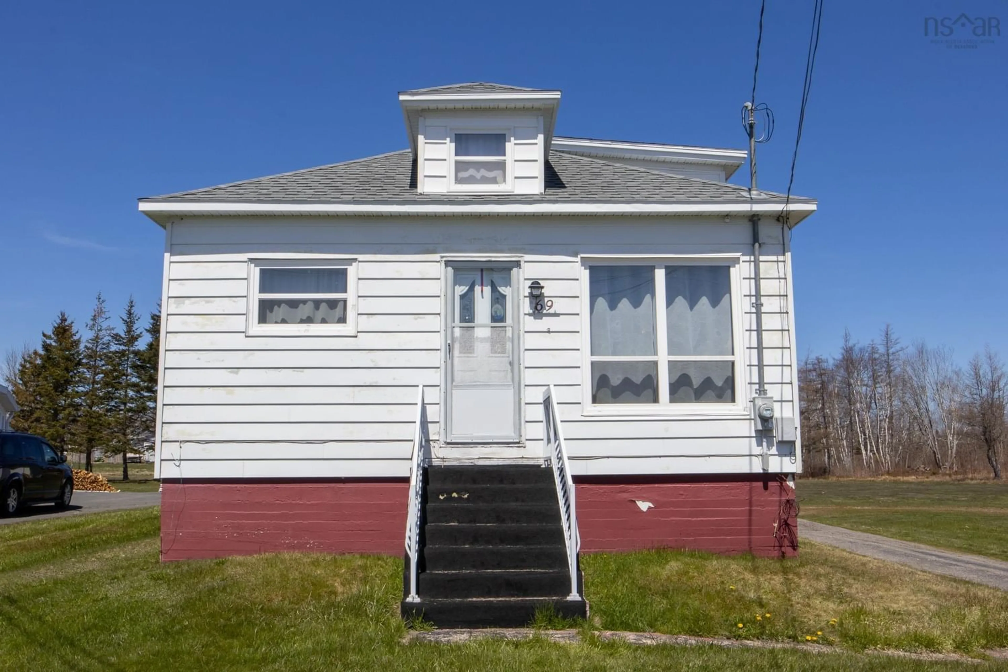 Frontside or backside of a home for 69 Wilson Rd, Reserve Mines Nova Scotia B1E 1L1