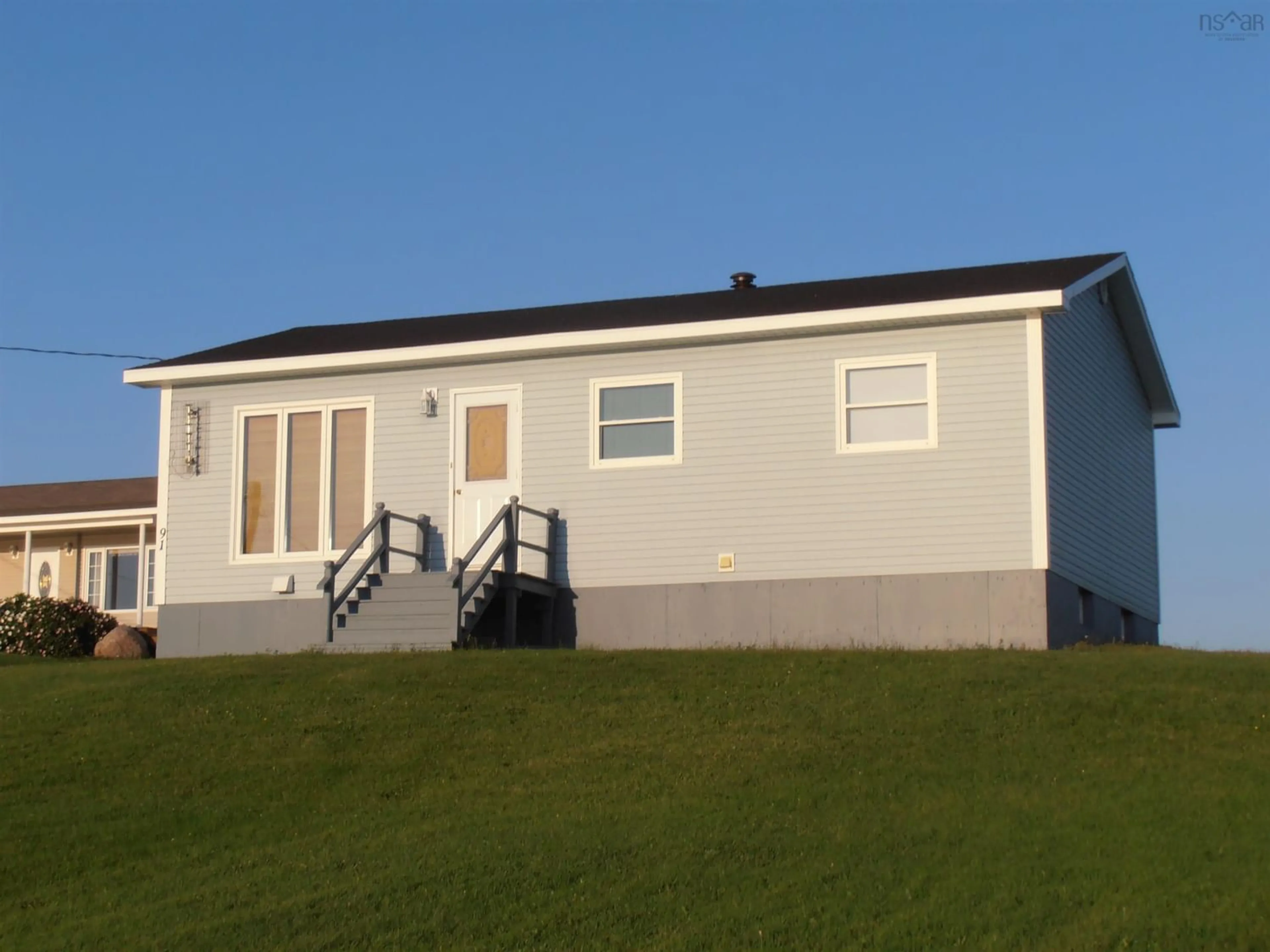 Frontside or backside of a home for 91 La Pointe Du Havre Rd, Chéticamp Island Nova Scotia B0E 1H0