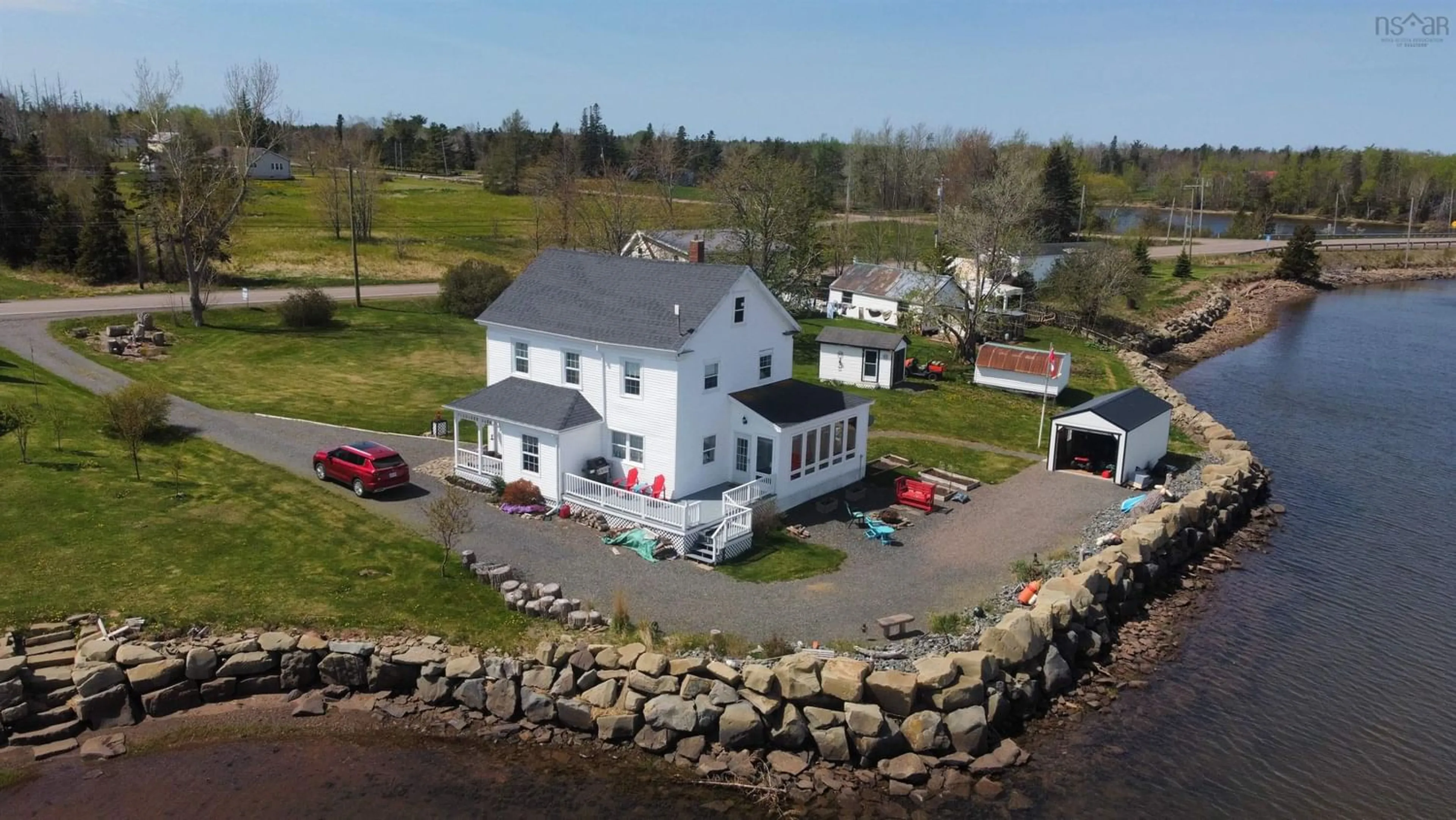 A pic from outside/outdoor area/front of a property/back of a property/a pic from drone, water/lake/river/ocean view for 13291 Highway 6, Wallace Bridge Nova Scotia B0K 1Y0