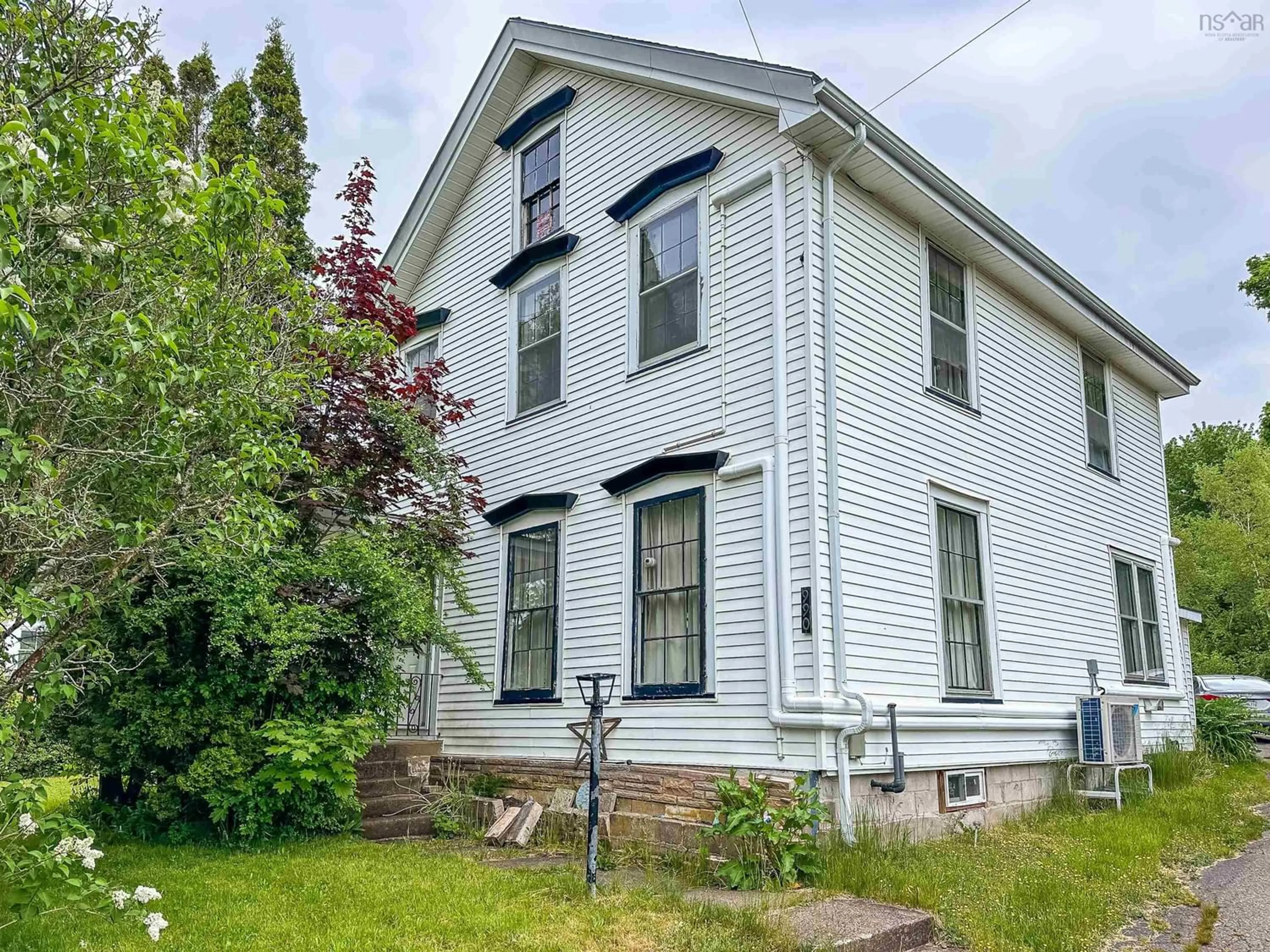 Frontside or backside of a home for 990 Pleasant St, Canning Nova Scotia B0P 1H0