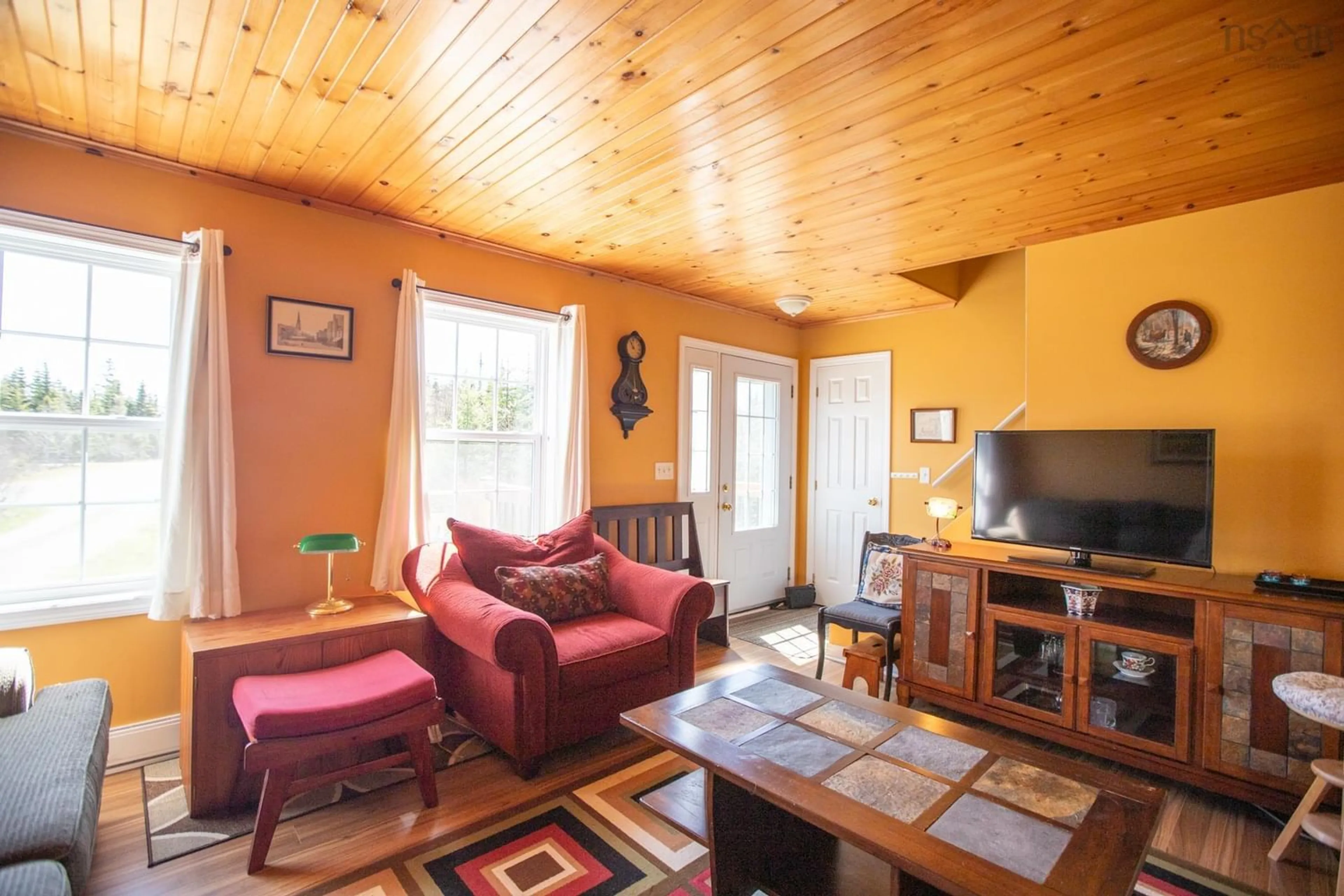 Living room, wood floors for 5 Osoogoone Lane, Clam Bay Nova Scotia B0J 2L0