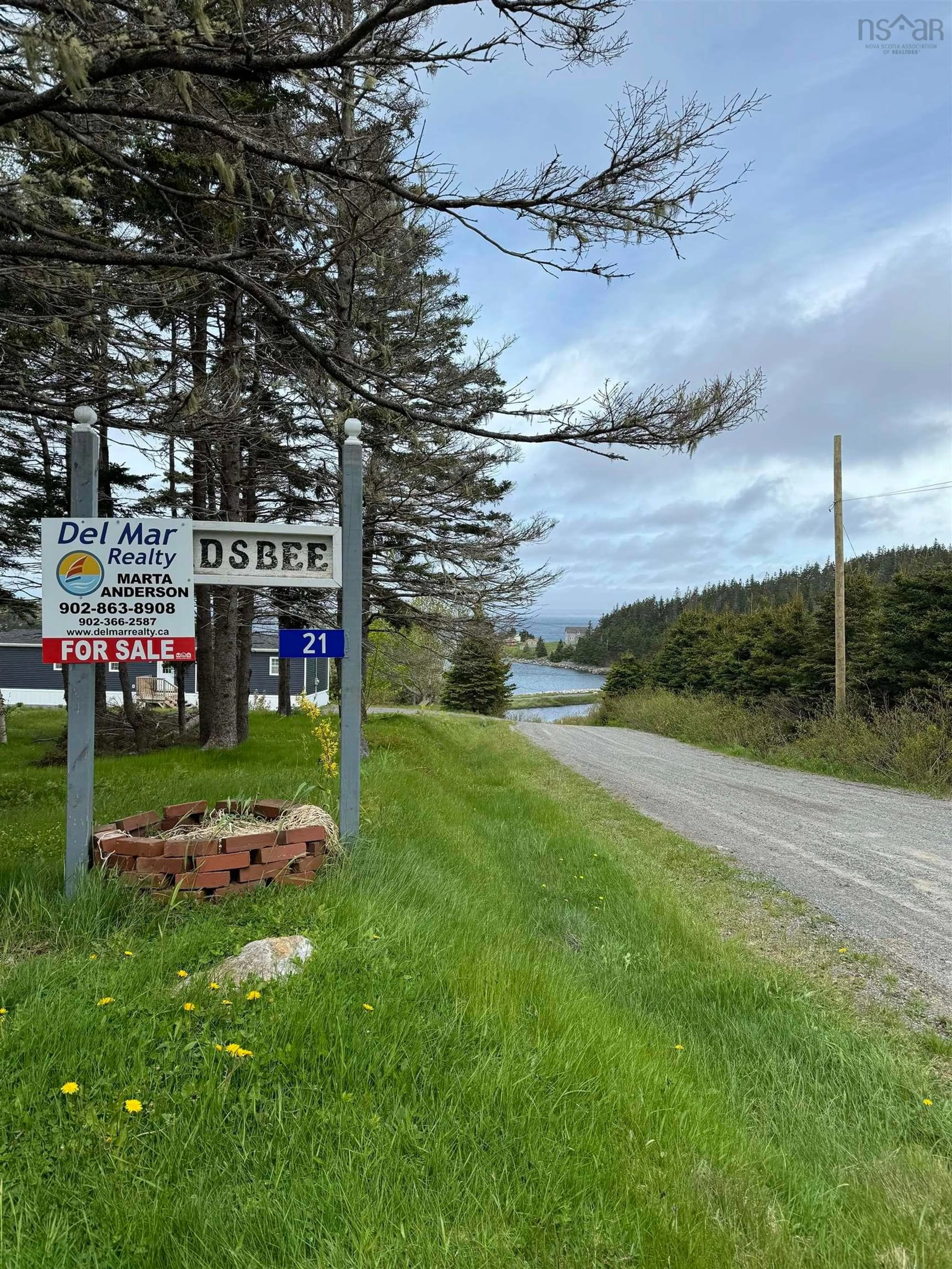 A pic from exterior of the house or condo, the street view for 21 Beach Lane, Philips Harbour Nova Scotia B0H 1N0