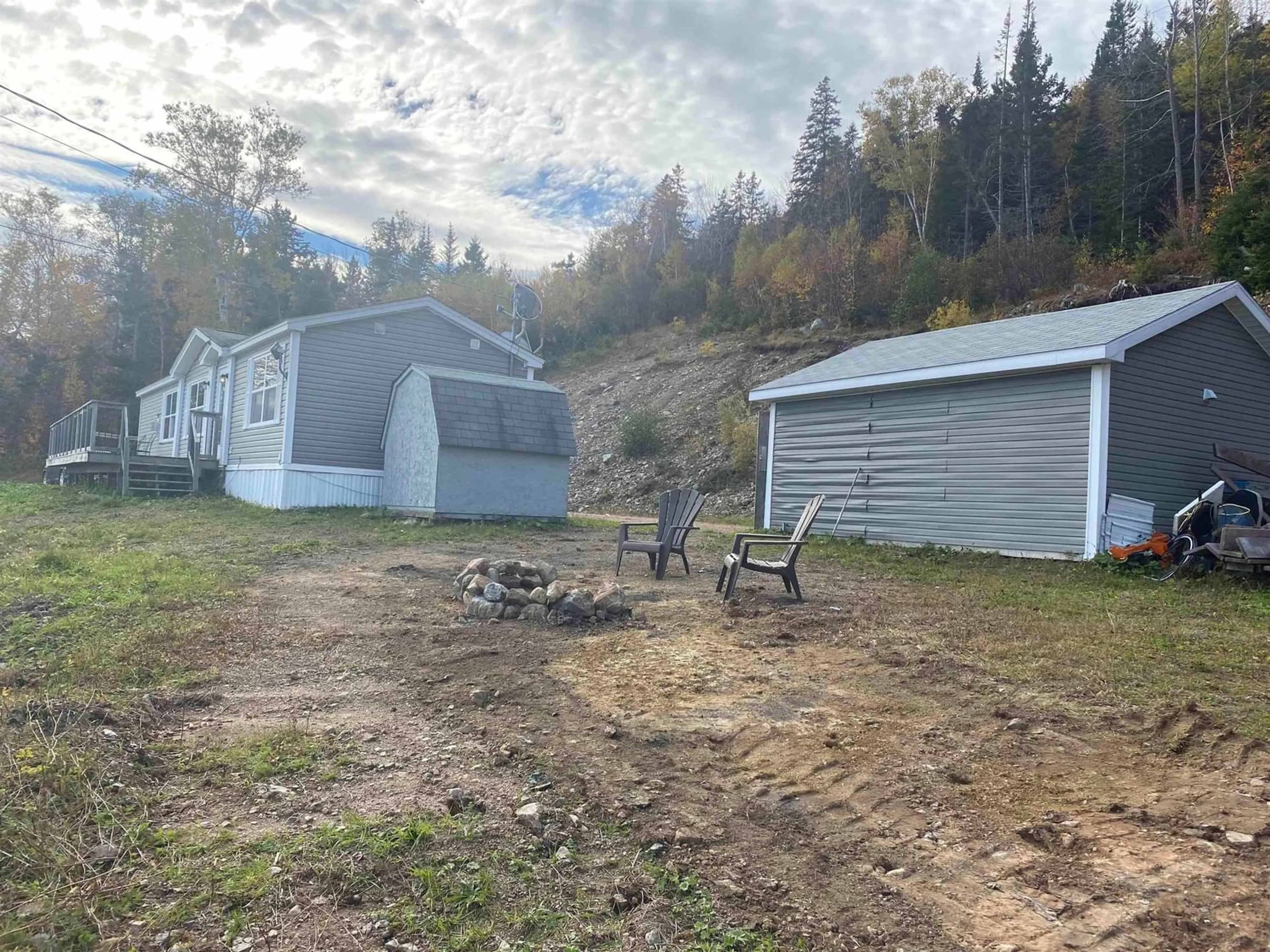 A pic from outside/outdoor area/front of a property/back of a property/a pic from drone, mountain view for 4289 Marble Mountain Rd, Lime Hill Nova Scotia B0E 3K0