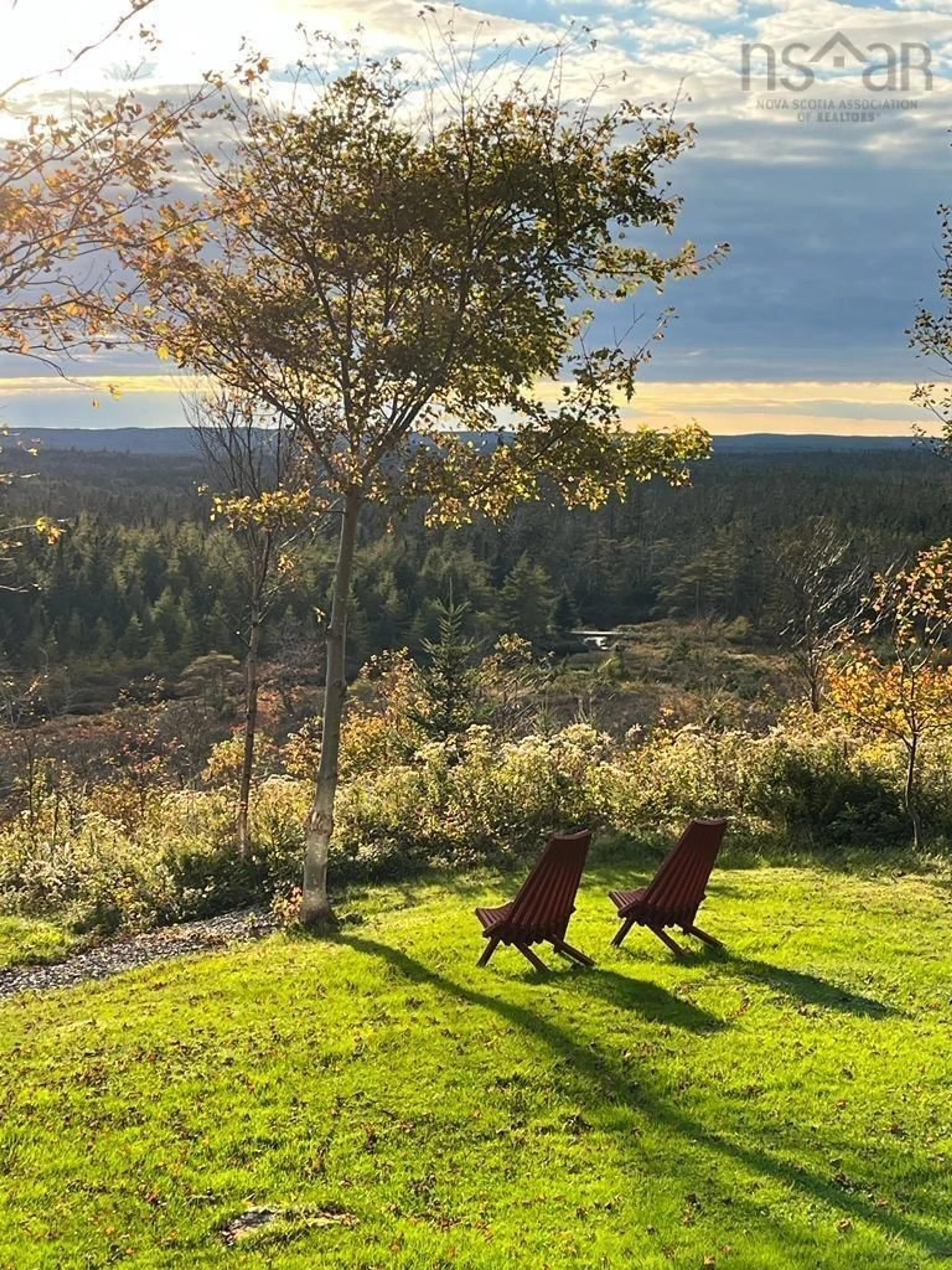 A pic from outside/outdoor area/front of a property/back of a property/a pic from drone, forest/trees view for 34 Eagle Valley Road, Upper Fox Island Nova Scotia B0H 1H0