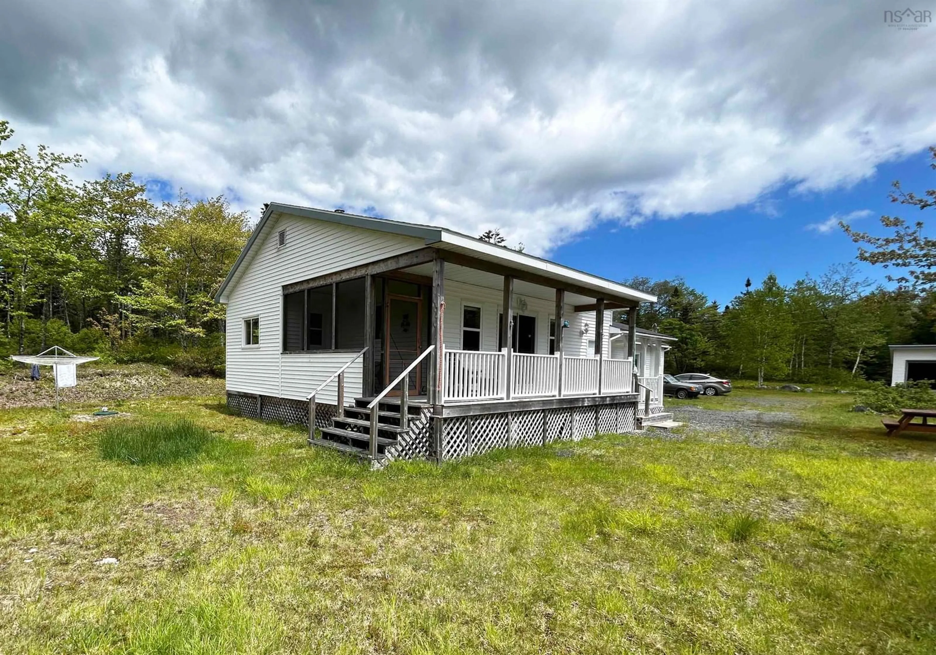 Outside view for 87 Somerset Dr, East Sable River Nova Scotia B0T 1V0