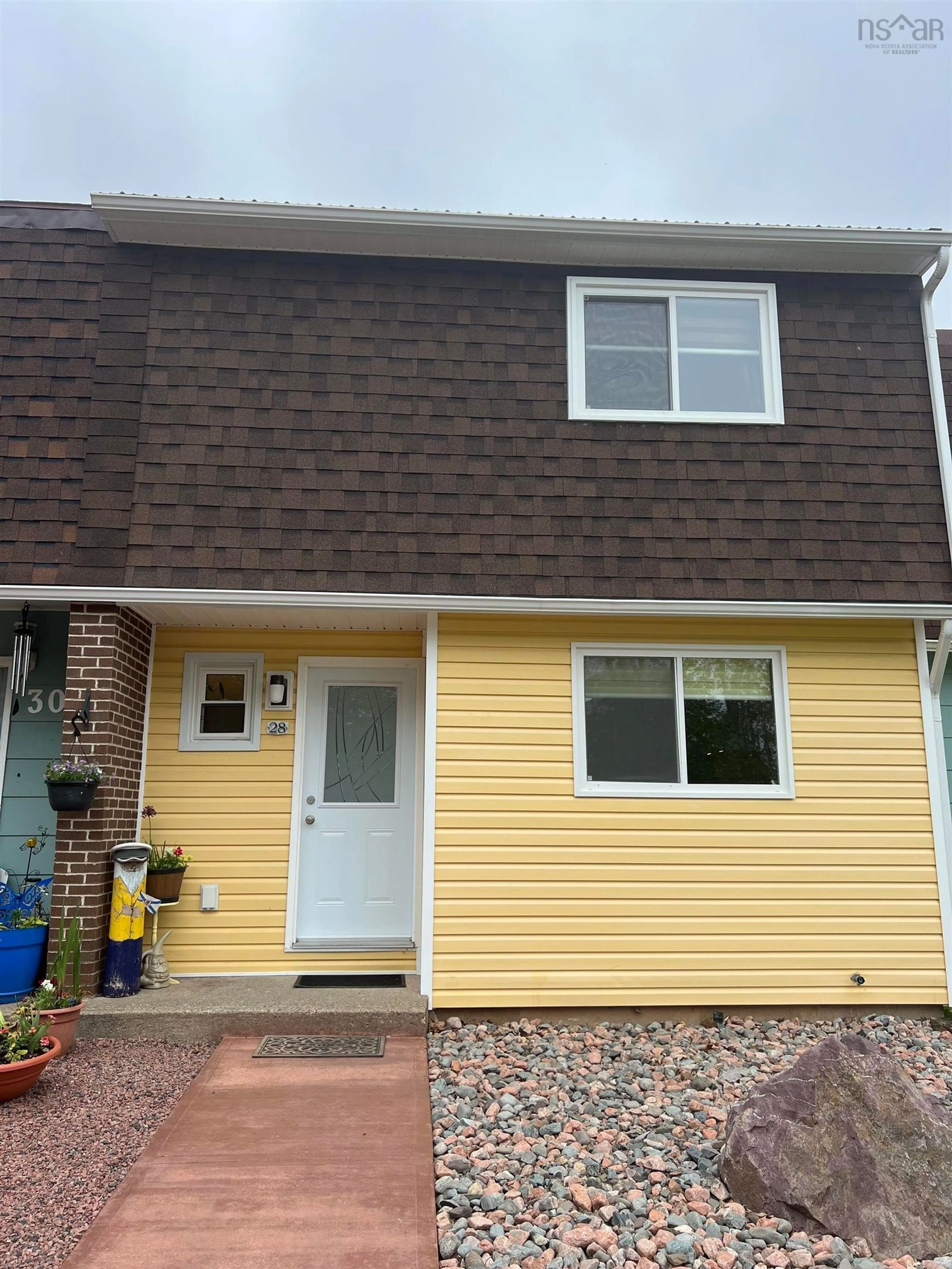 Home with vinyl exterior material for 28 Hector Ave, Pictou Nova Scotia B0K 1H0