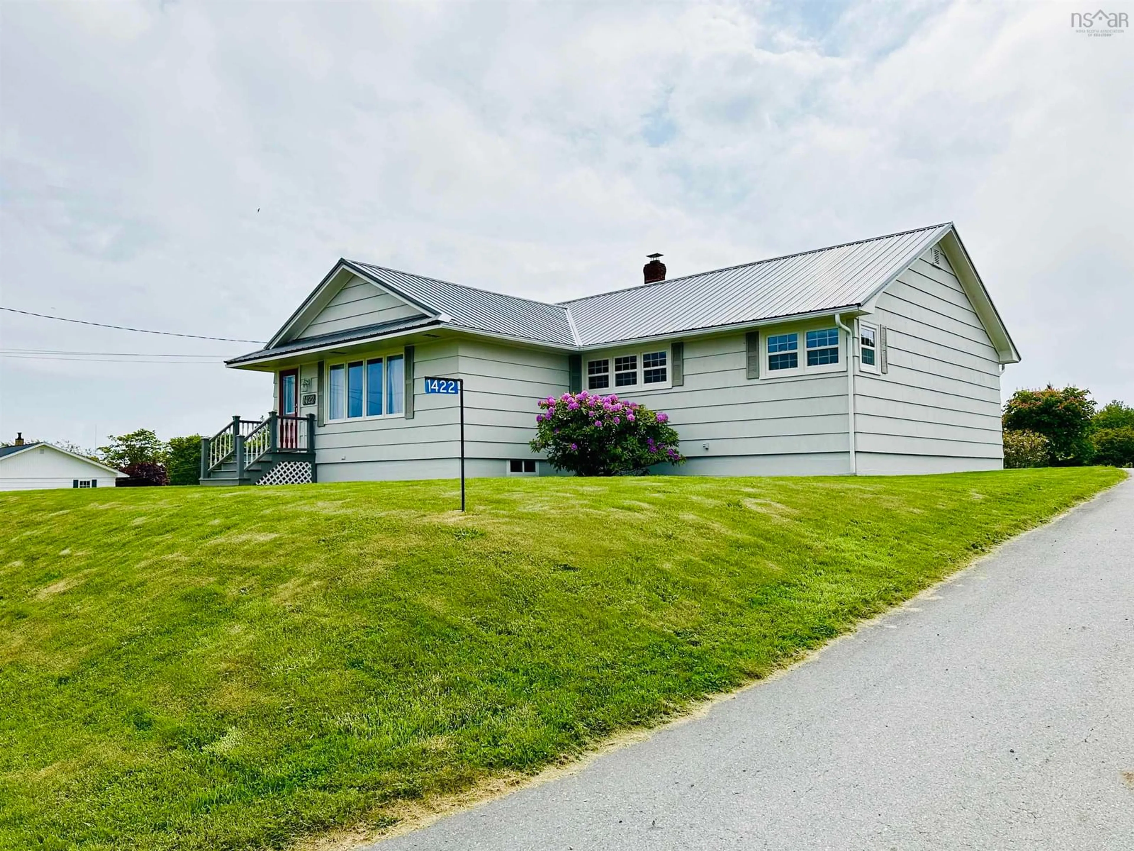 Frontside or backside of a home for 1422 Highway 335, Middle West Pubnico Nova Scotia B0W 3S0