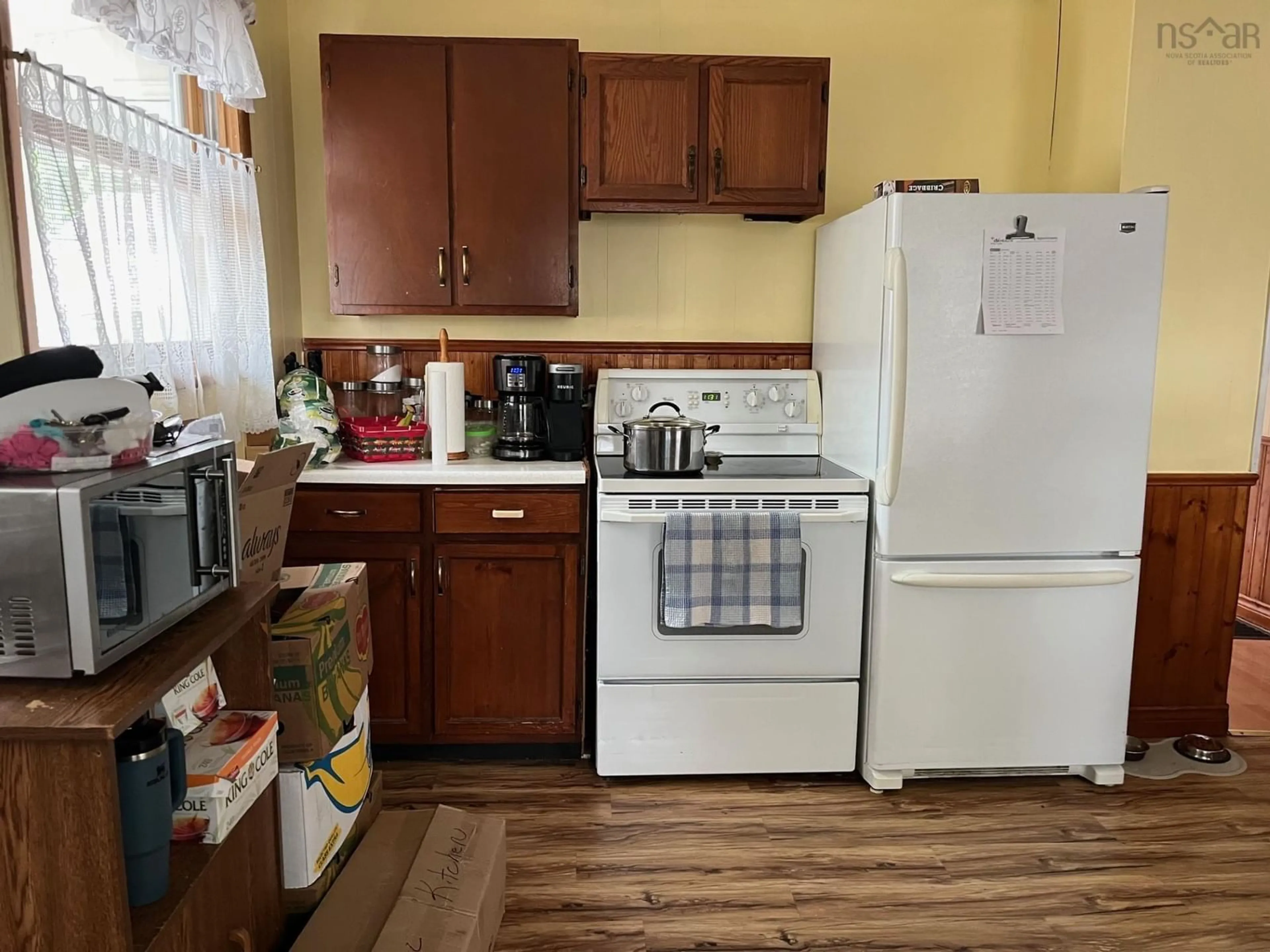 Standard kitchen, wood floors, cottage for 23 Young Ave, North Sydney Nova Scotia B2A 1Y7