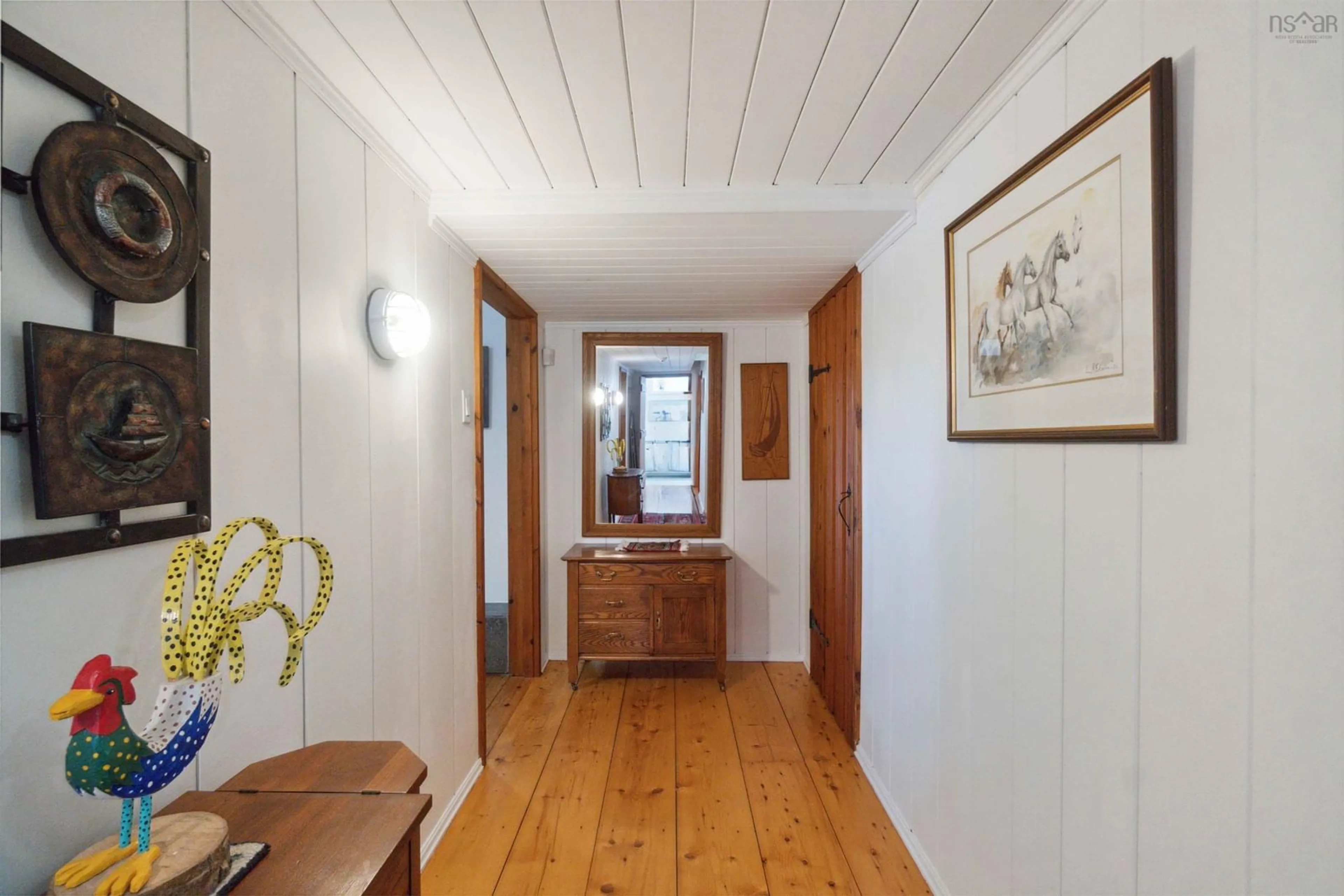 Indoor foyer, wood floors for 1077 Shore Dr, Bedford Nova Scotia B4A 2E6