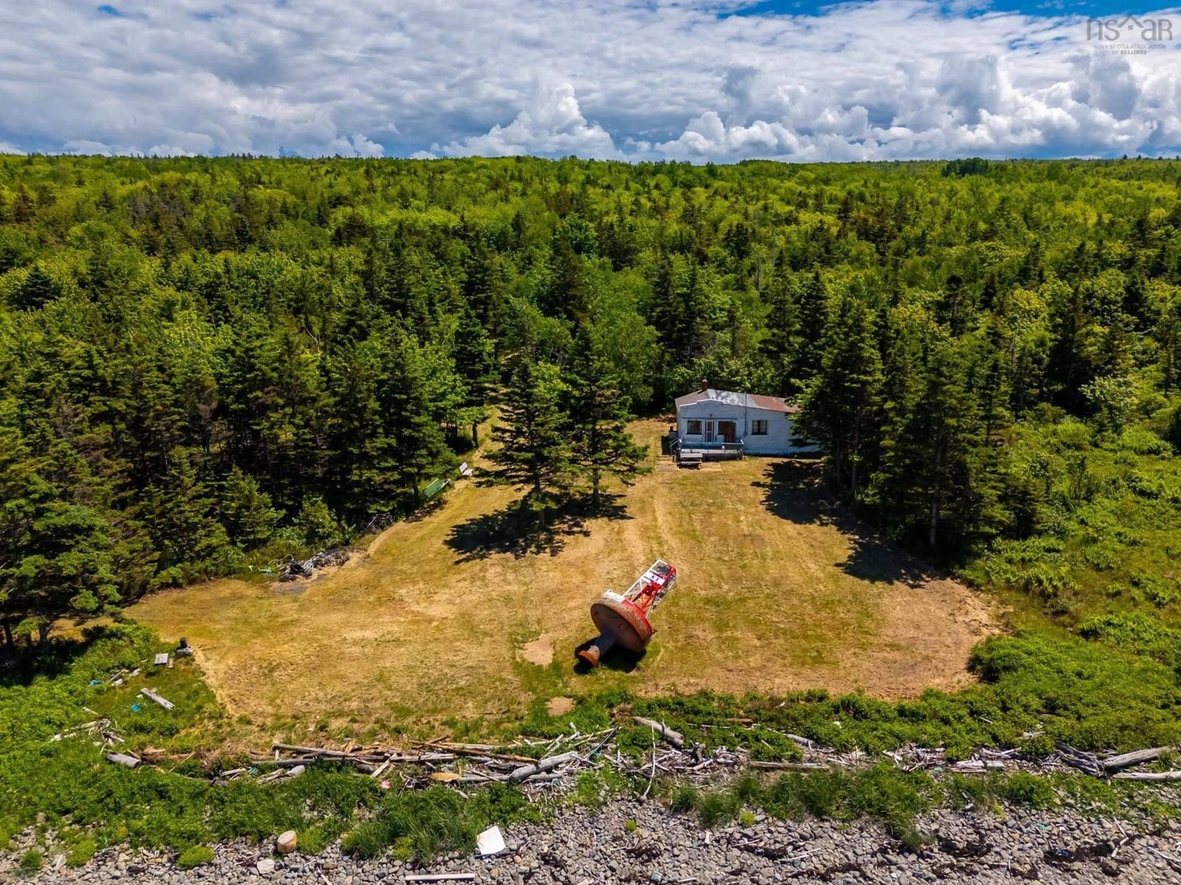 A pic from outside/outdoor area/front of a property/back of a property/a pic from drone, forest/trees view for 6847 Shore Rd, Phinneys Cove Nova Scotia B0S 1C0