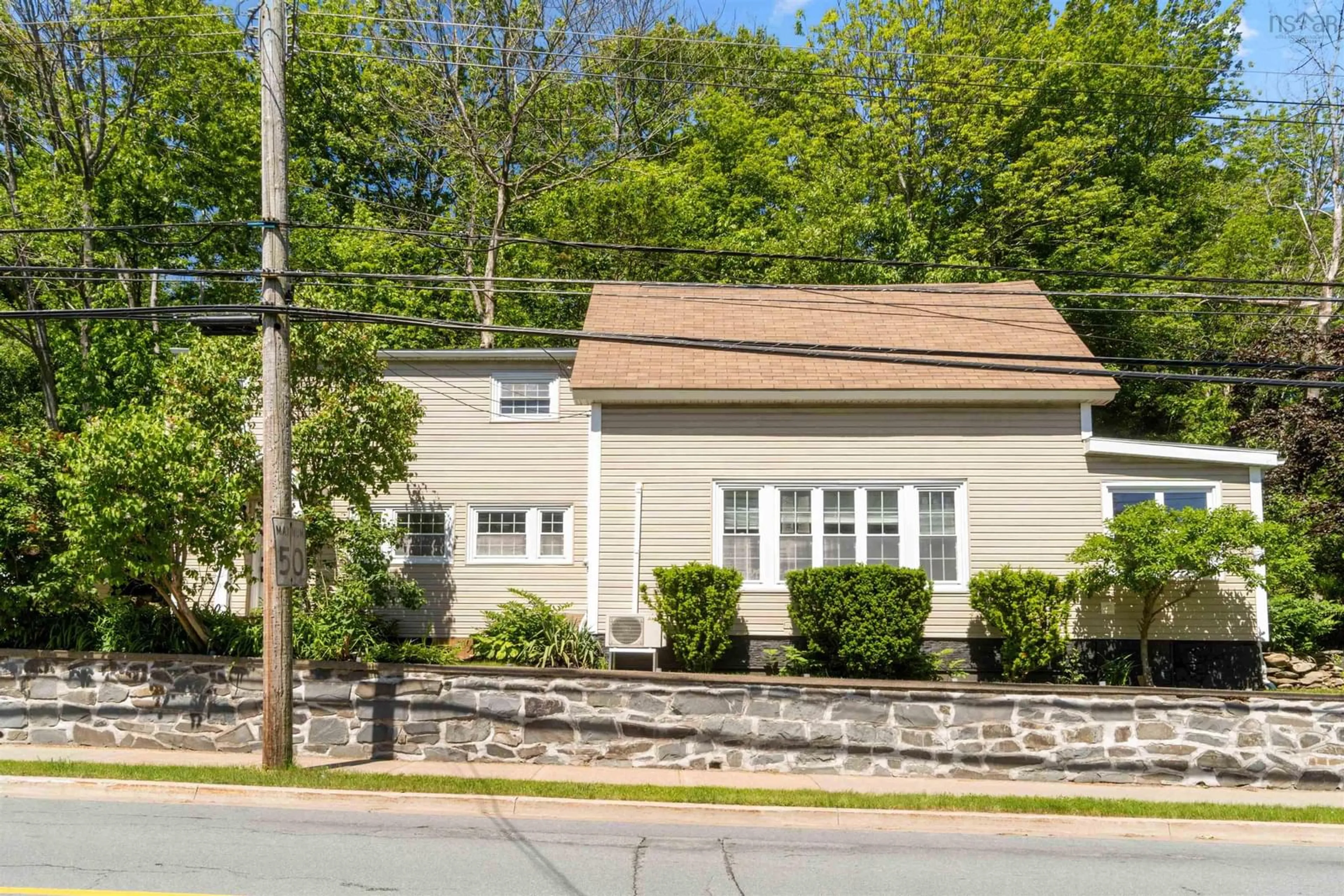 Home with vinyl exterior material for 31 Meadowbrook Dr, Bedford Nova Scotia B4A 1P8