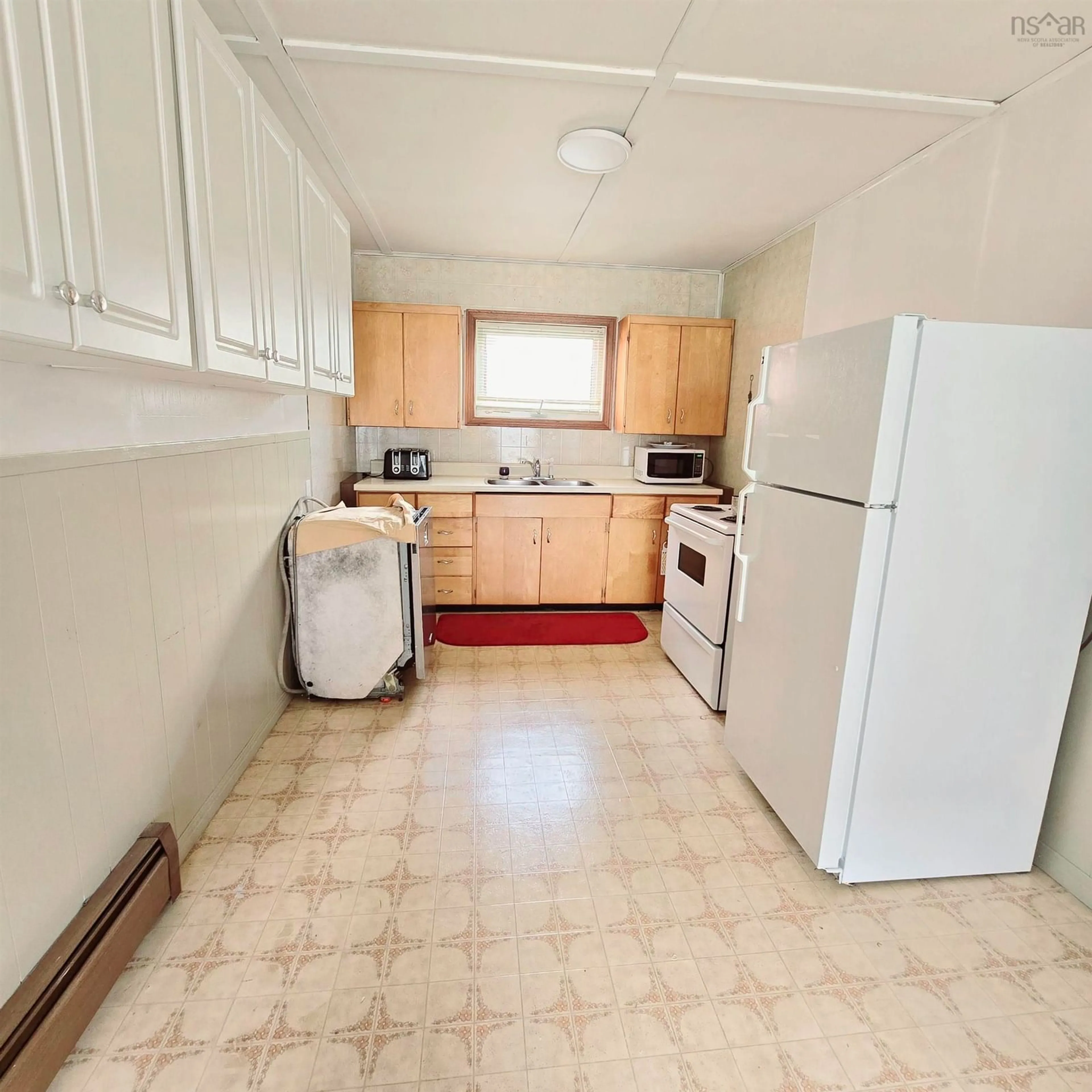 Standard kitchen, unknown floor, cottage for 7561 Main St, Louisbourg Nova Scotia B1C 1J7