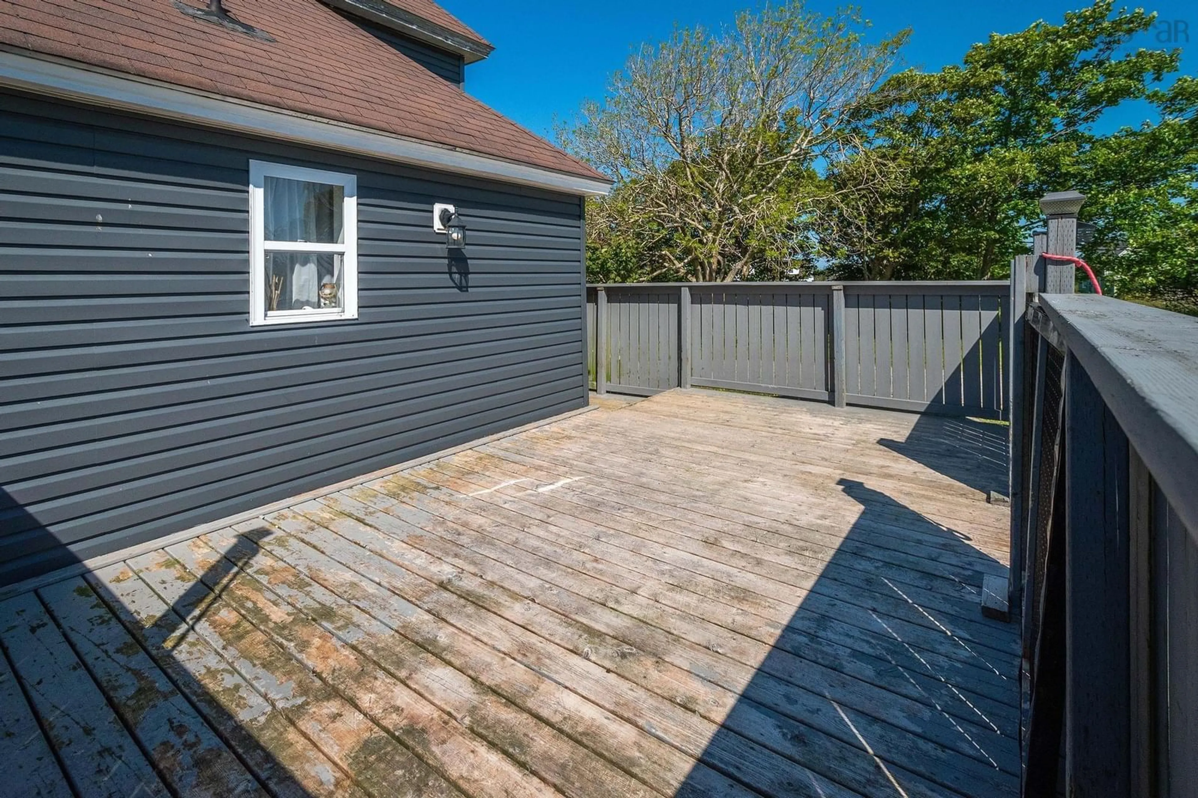 Patio, the fenced backyard for 1 Atlantic St, Clark's Harbour Nova Scotia B0W 1P0