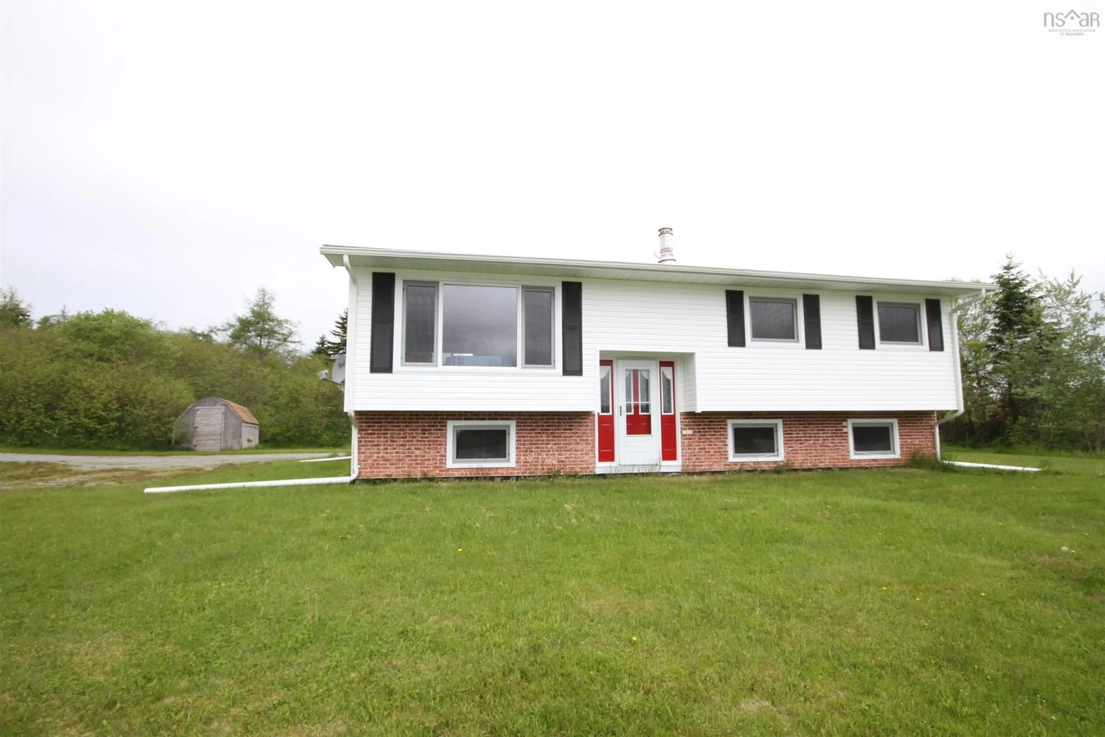 Home with vinyl exterior material for 103 Riverview Dr, River Bourgeois Nova Scotia B0E 2X0