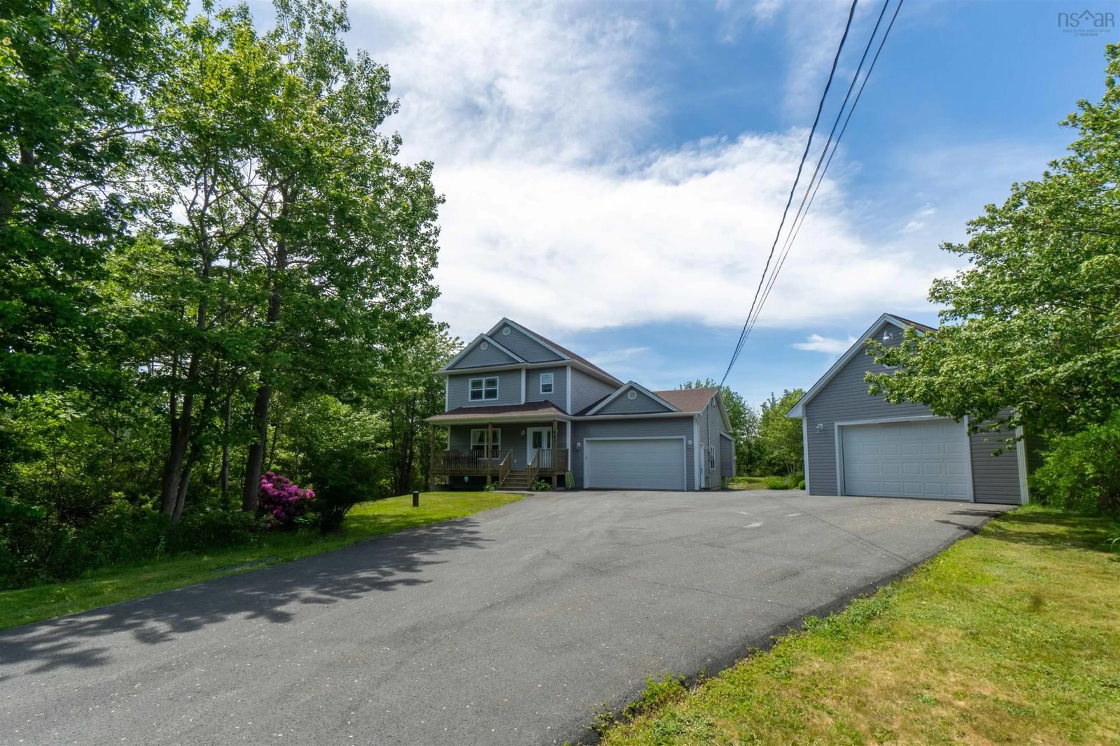 Frontside or backside of a home for 887 Bissett Rd, Cow Bay Nova Scotia B3G 0A5