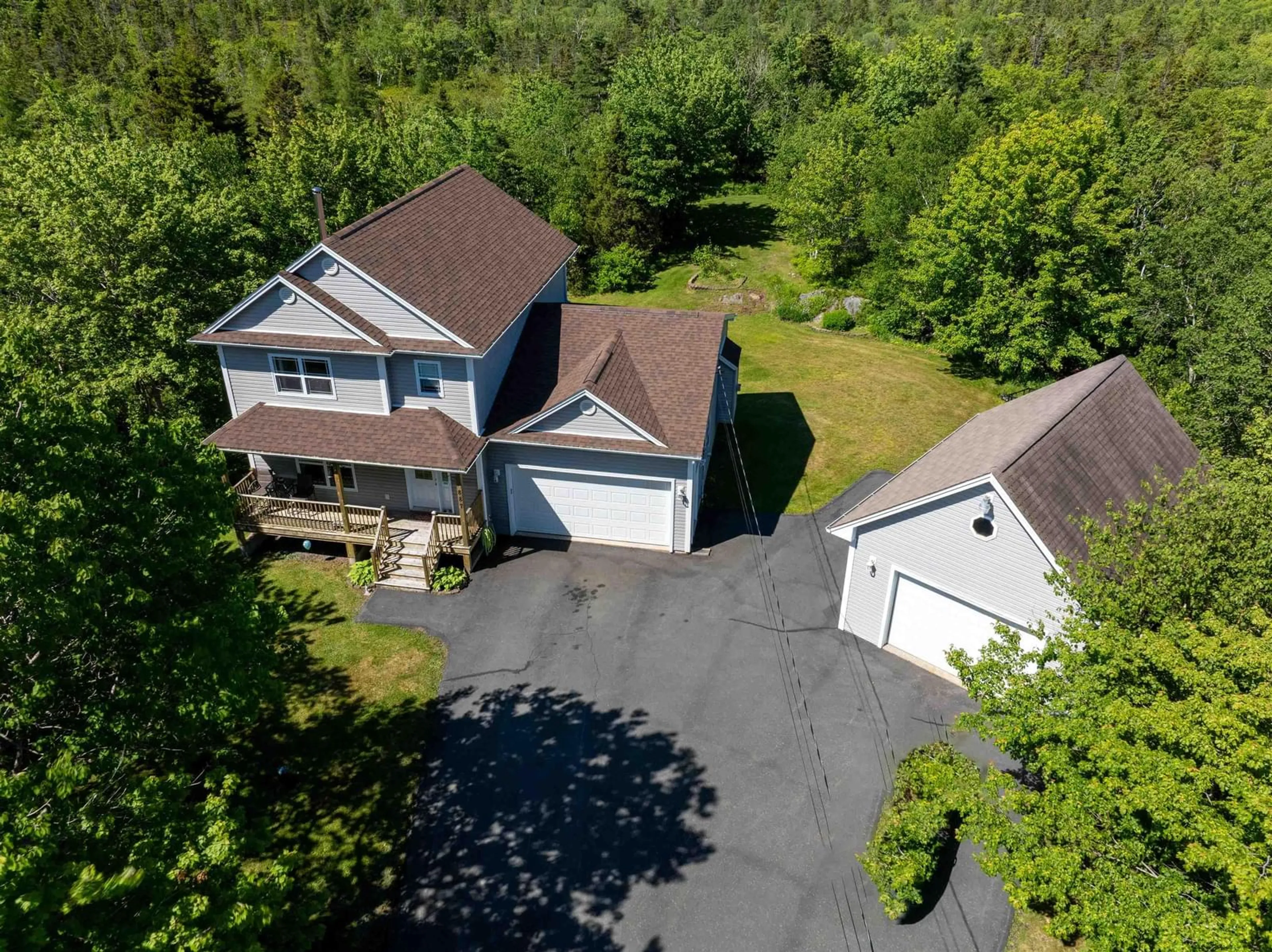 Frontside or backside of a home for 887 Bissett Rd, Cow Bay Nova Scotia B3G 0A5
