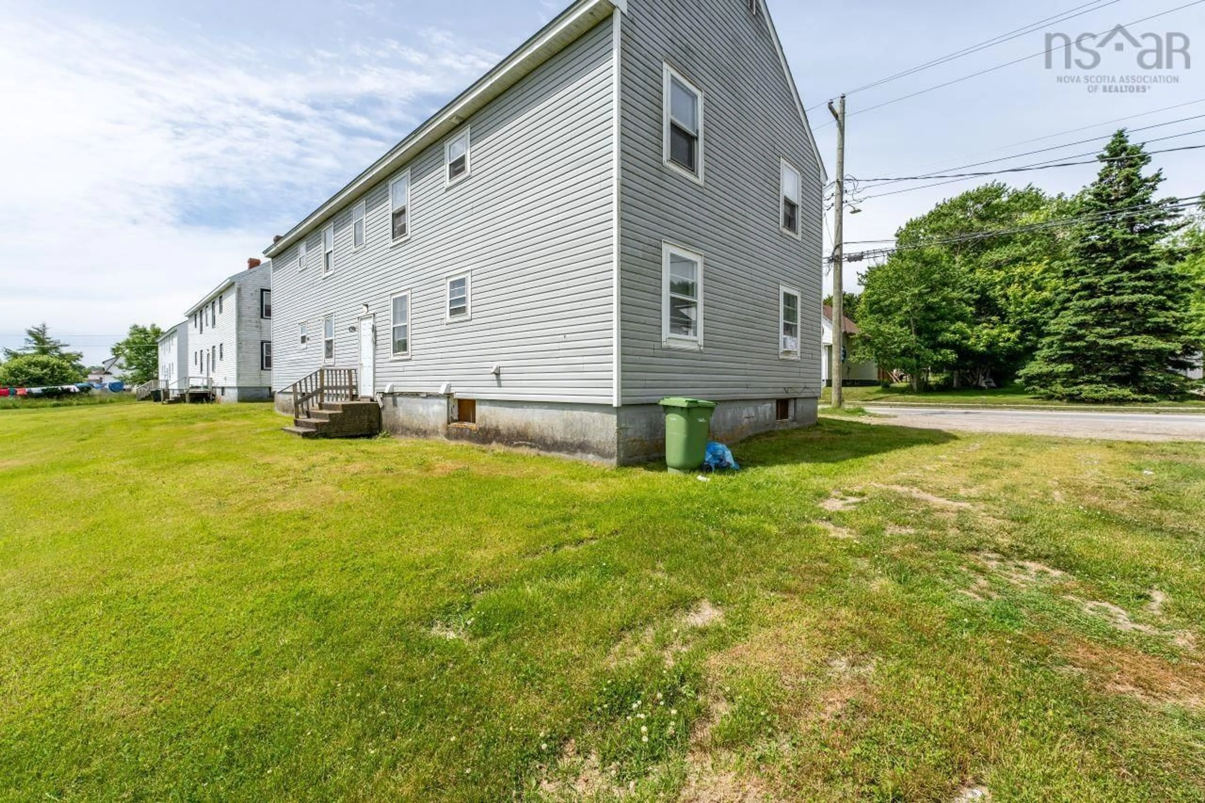 A pic from exterior of the house or condo, the front or back of building for 67 Pleasant St, Yarmouth Nova Scotia B5A 2J3