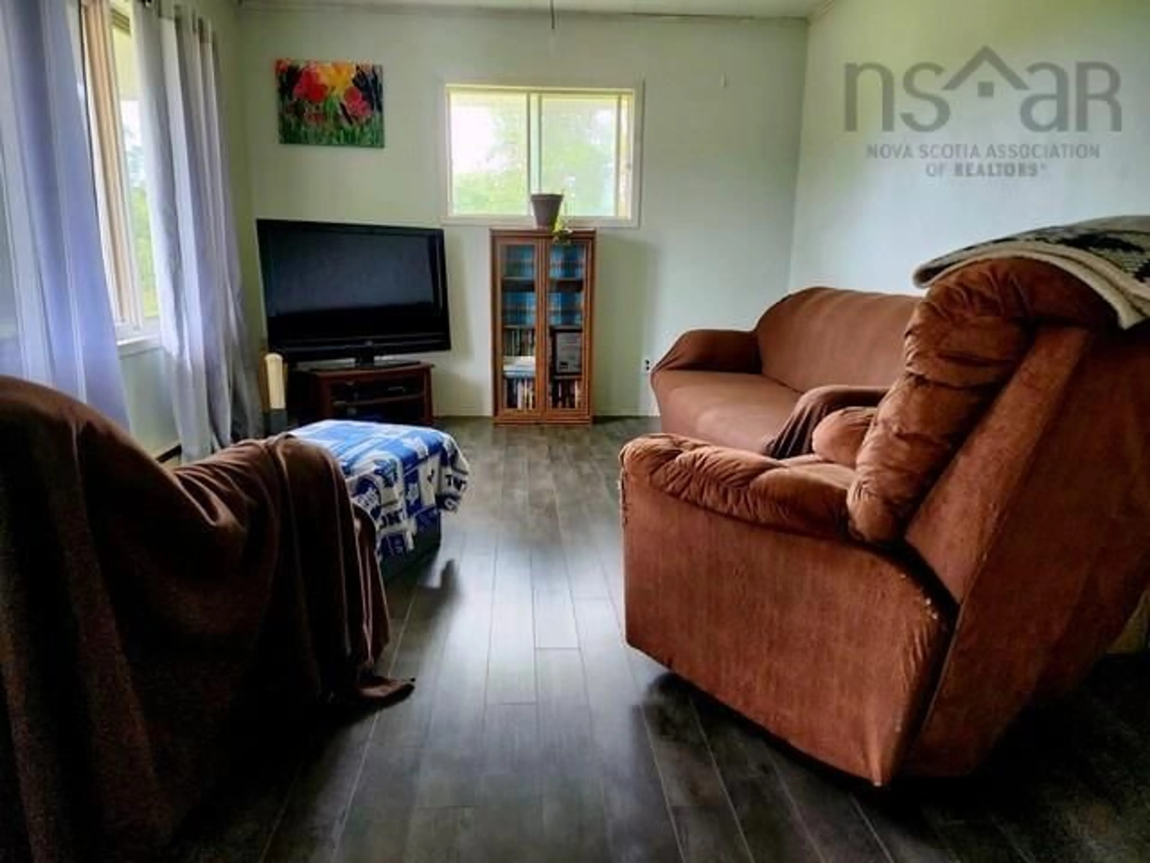 Living room, wood floors for 268 Stoney Island Rd, North East Point Nova Scotia B0W 3J0