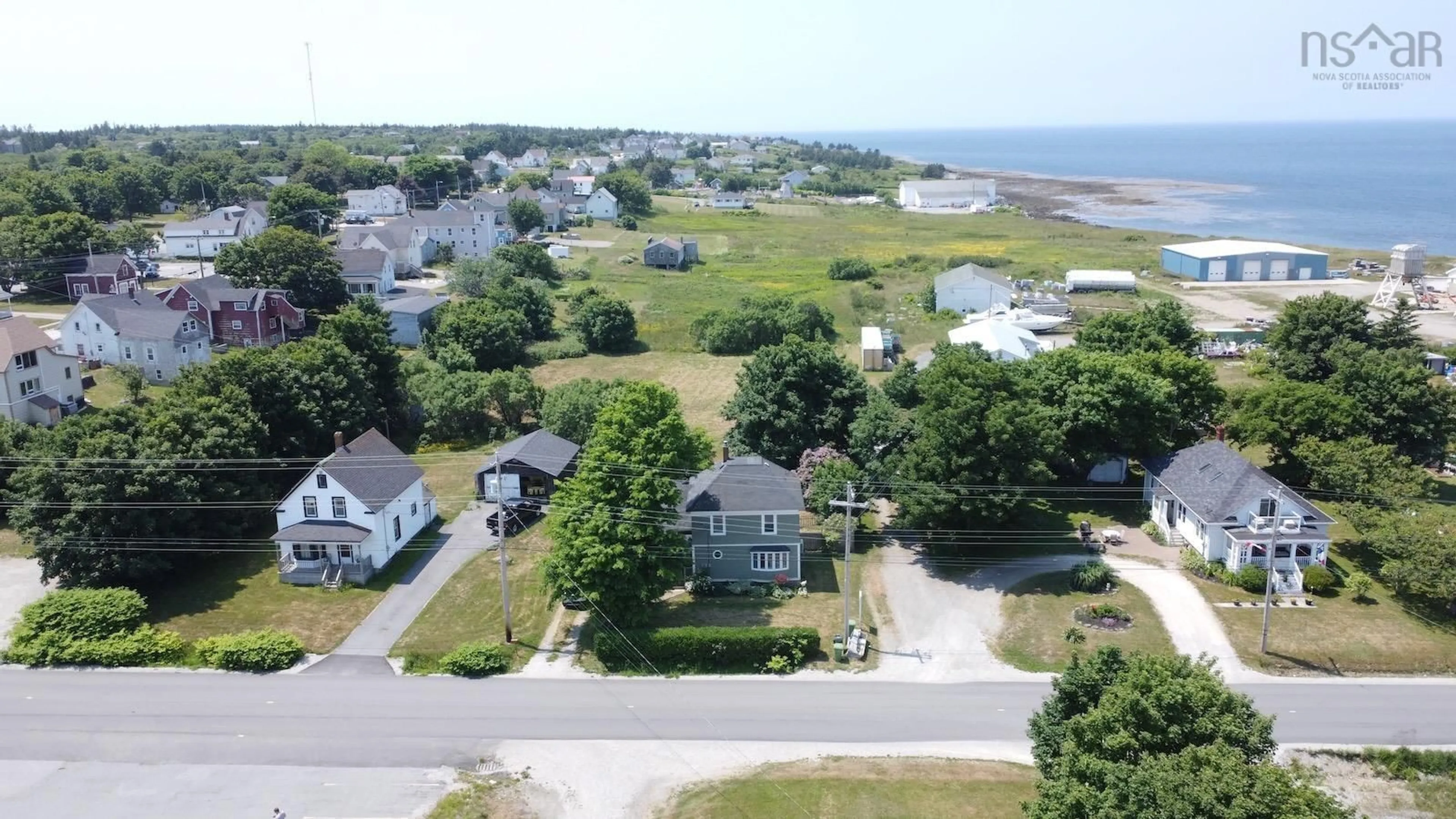 A pic from exterior of the house or condo, the fenced backyard for 100 Peter Dugas Rd, Meteghan Nova Scotia B0W 2J0