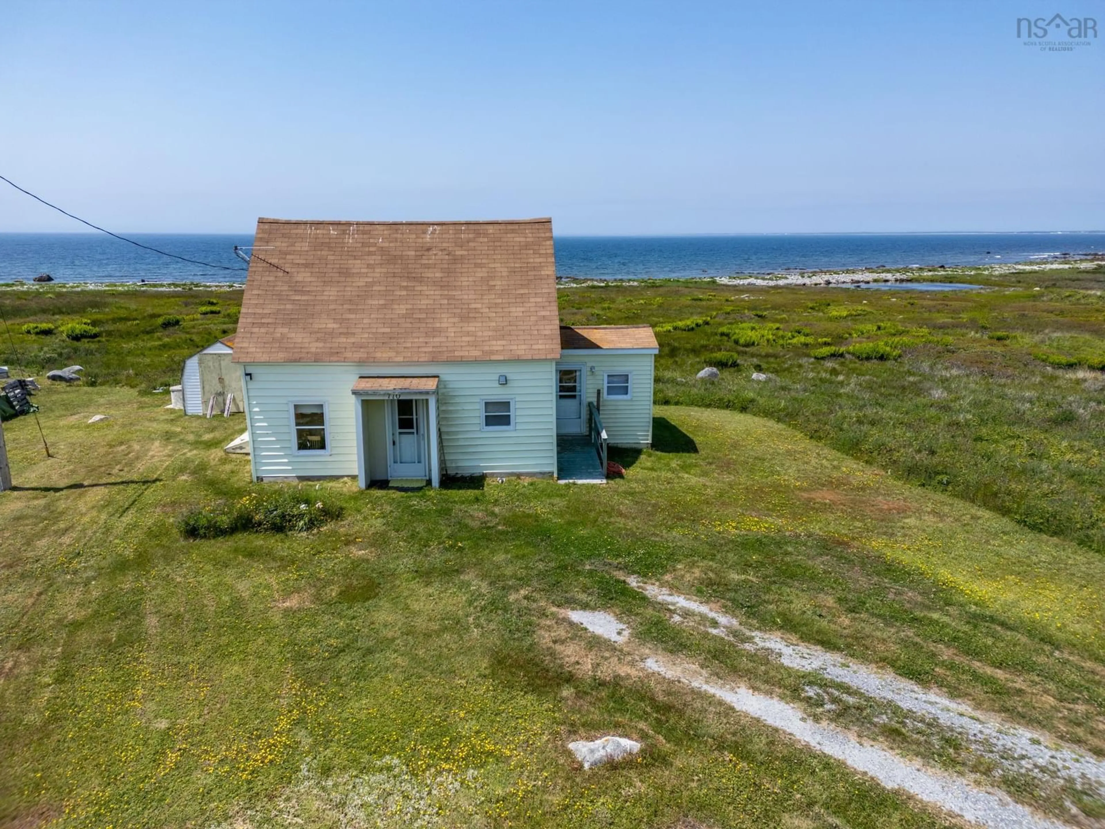 A pic from outside/outdoor area/front of a property/back of a property/a pic from drone, water/lake/river/ocean view for 710 Baccaro Rd, East Baccaro Nova Scotia B0W 1E0