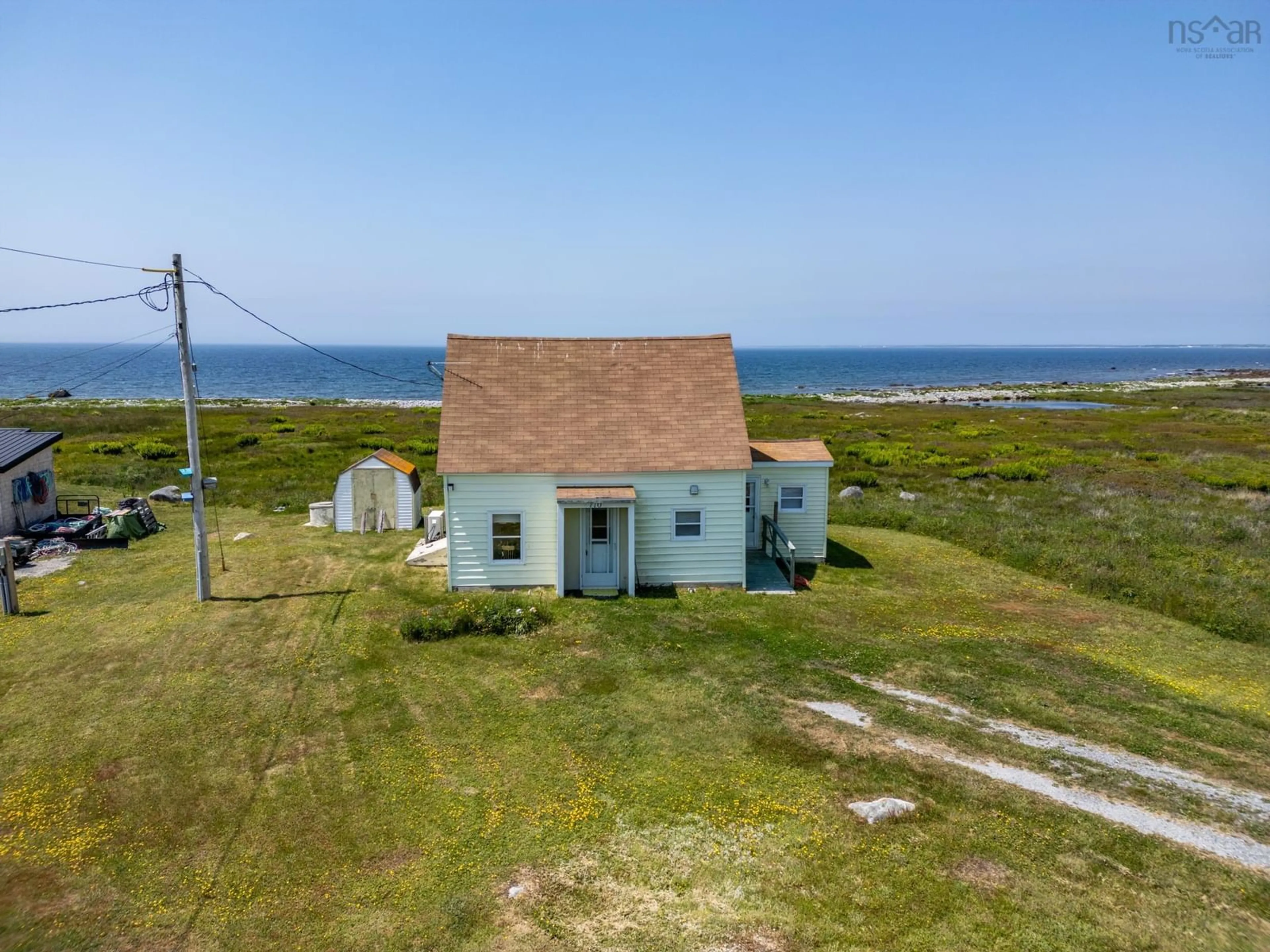 A pic from outside/outdoor area/front of a property/back of a property/a pic from drone, water/lake/river/ocean view for 710 Baccaro Rd, East Baccaro Nova Scotia B0W 1E0