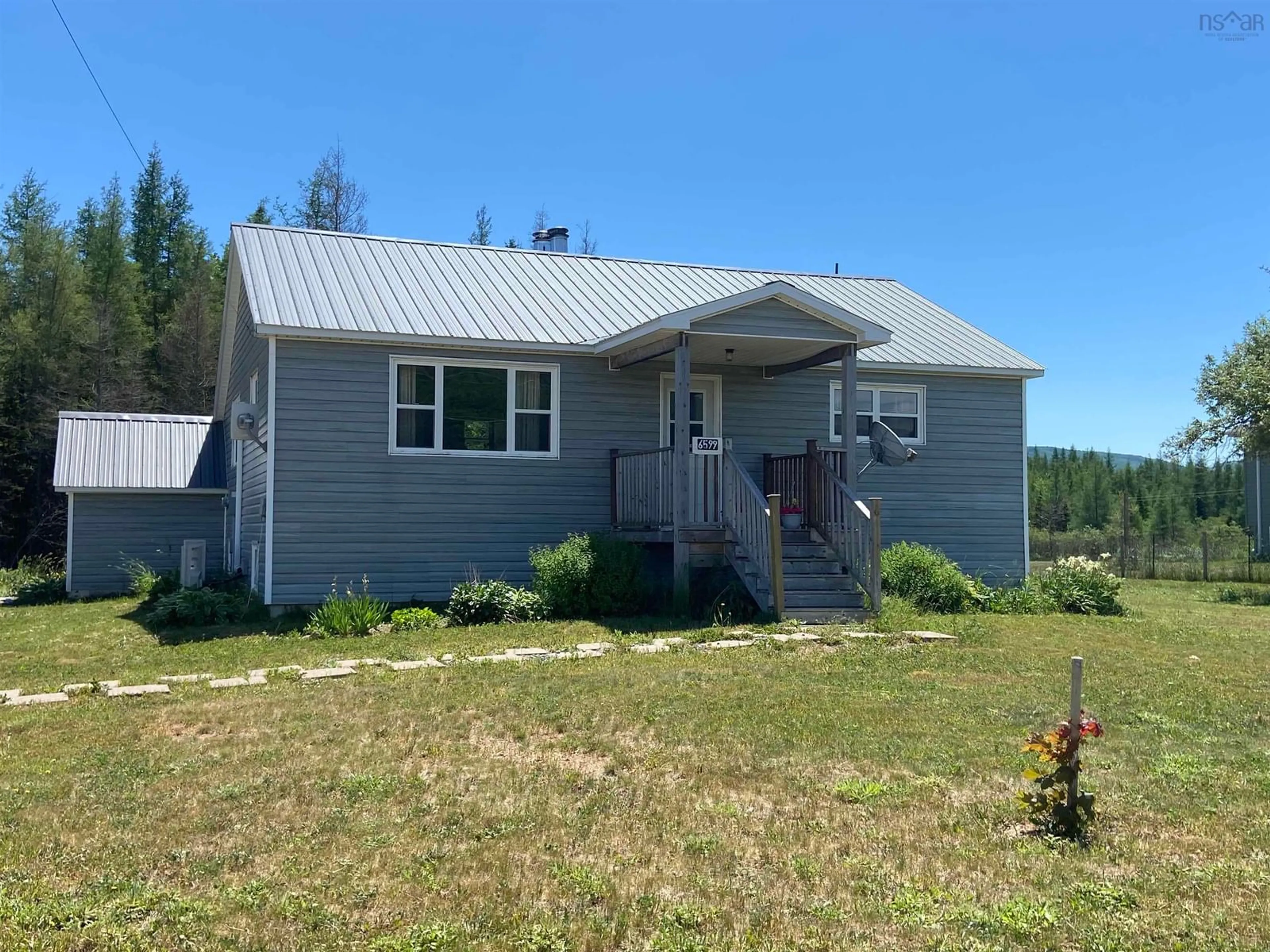 Frontside or backside of a home for 6599 Cabot Trail, North East Margaree Nova Scotia B0E 2K0