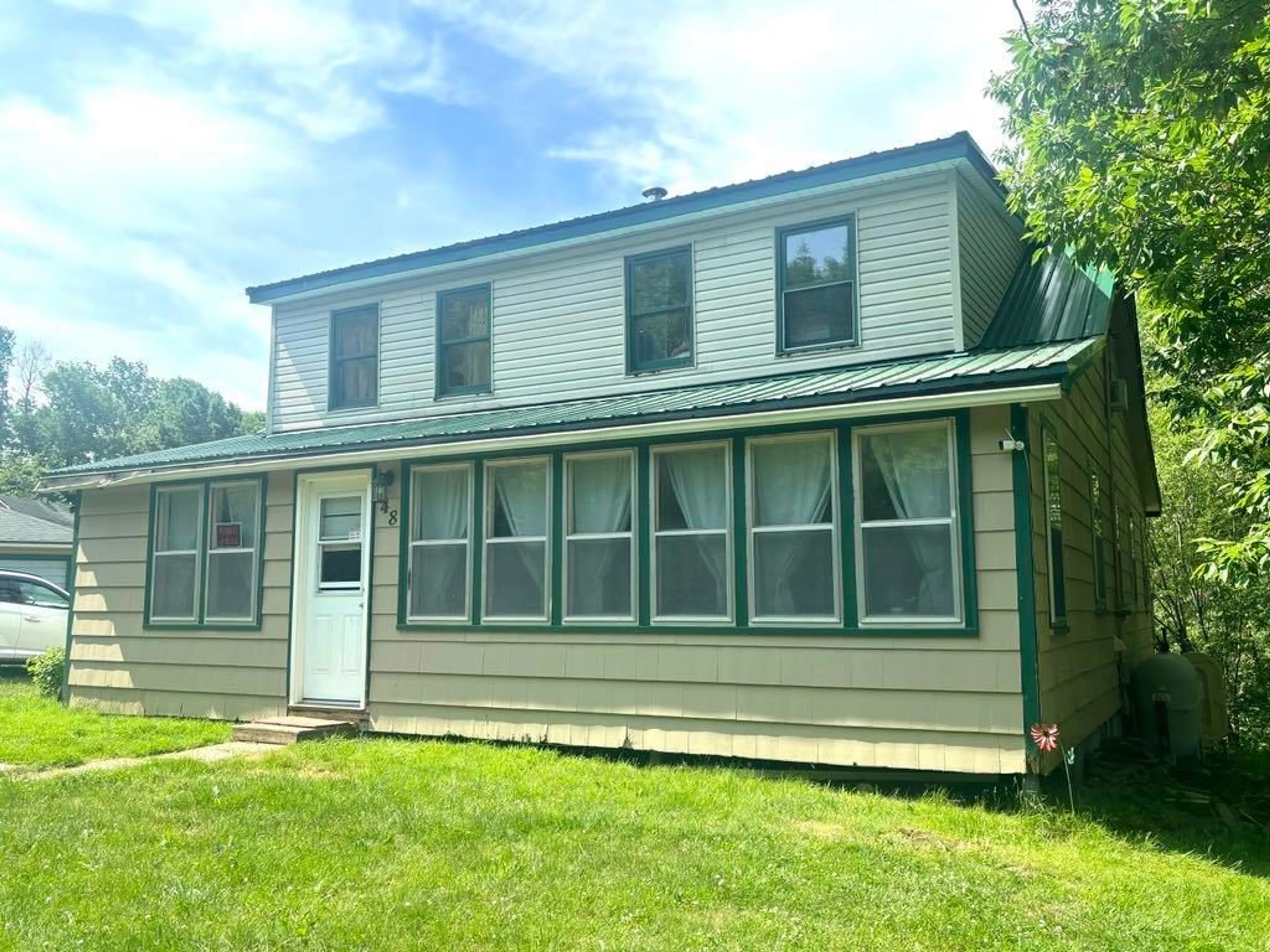 Home with vinyl exterior material for 48 Pecks Hill Road, Bear River Nova Scotia B0S 1B0