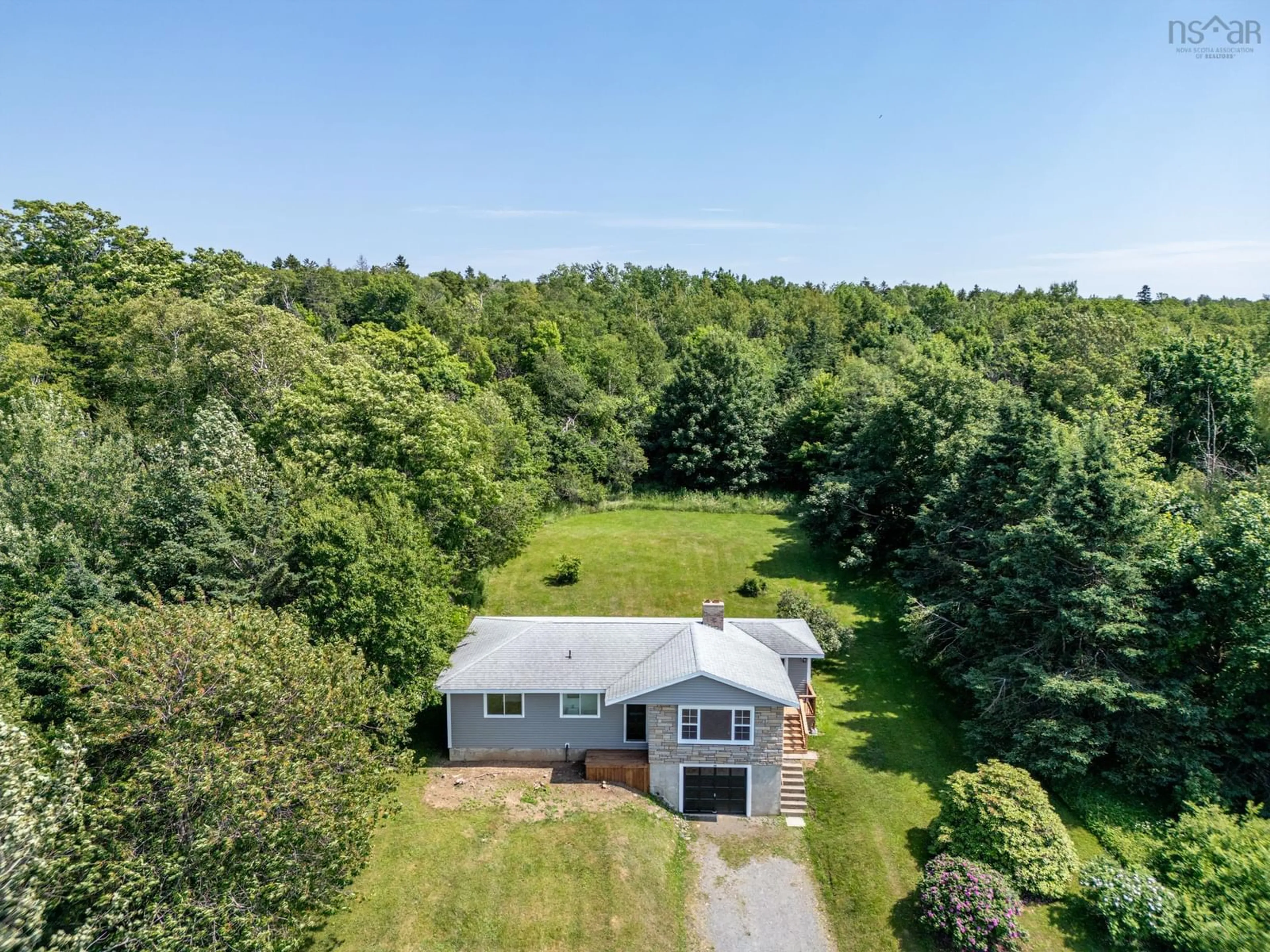 A pic from outside/outdoor area/front of a property/back of a property/a pic from drone, unknown for 172 Highway 1, Smiths Cove Nova Scotia B0S 1S0