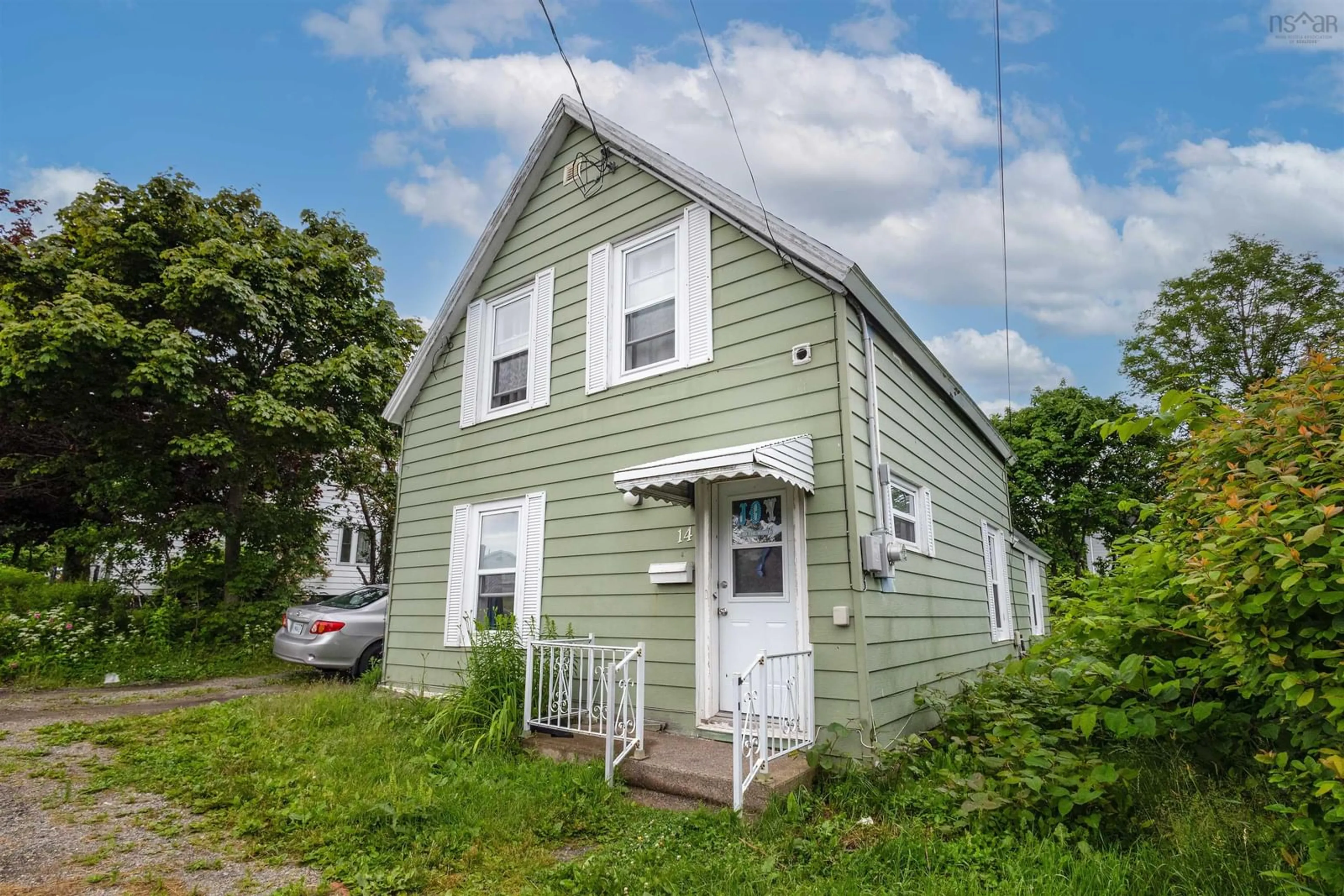 Frontside or backside of a home for 14 Mcdougall St, Glace Bay Nova Scotia B1A 3R7