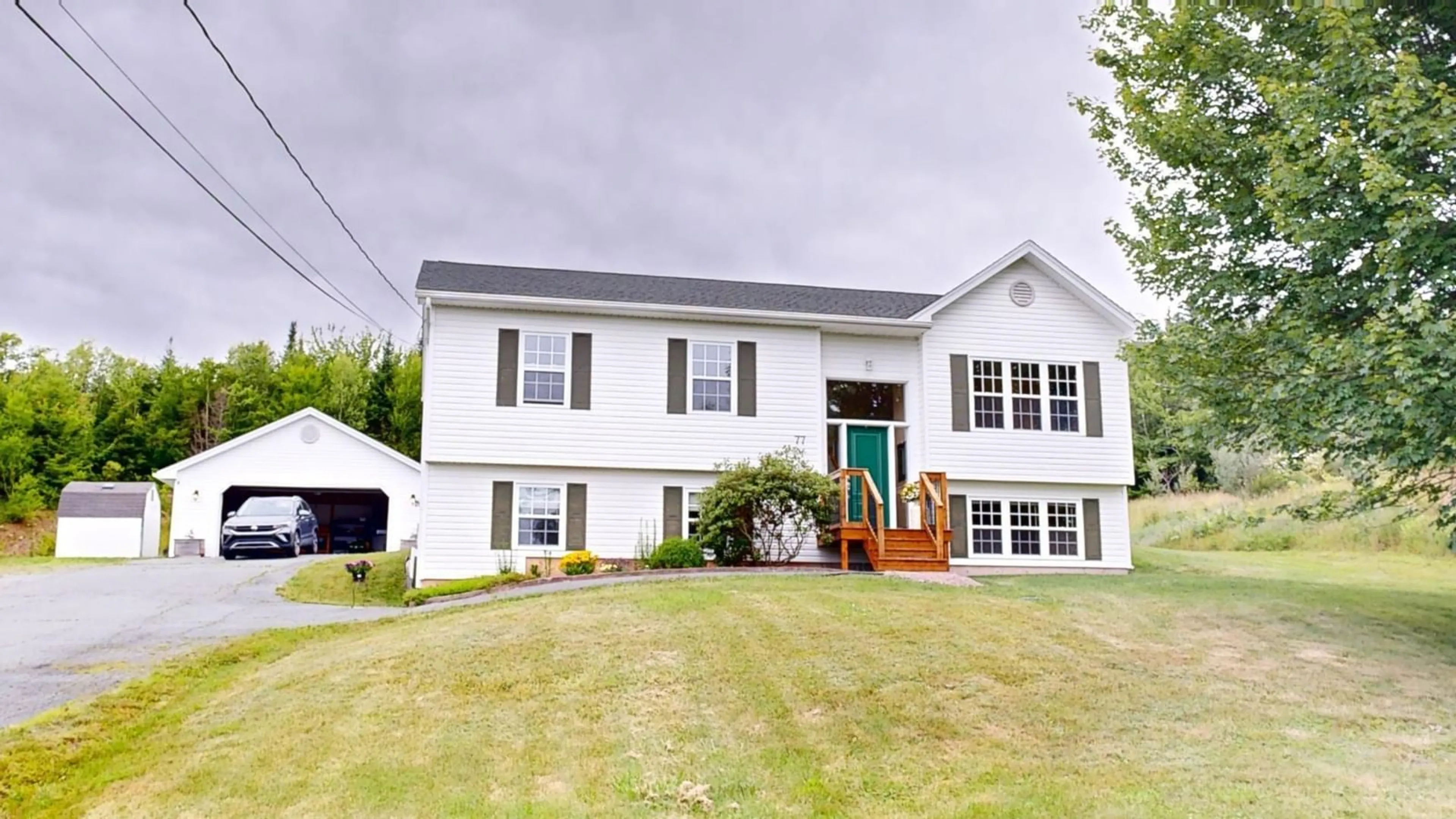 Frontside or backside of a home for 77 Lindforest Crt, Middle Sackville Nova Scotia B4E 3J2