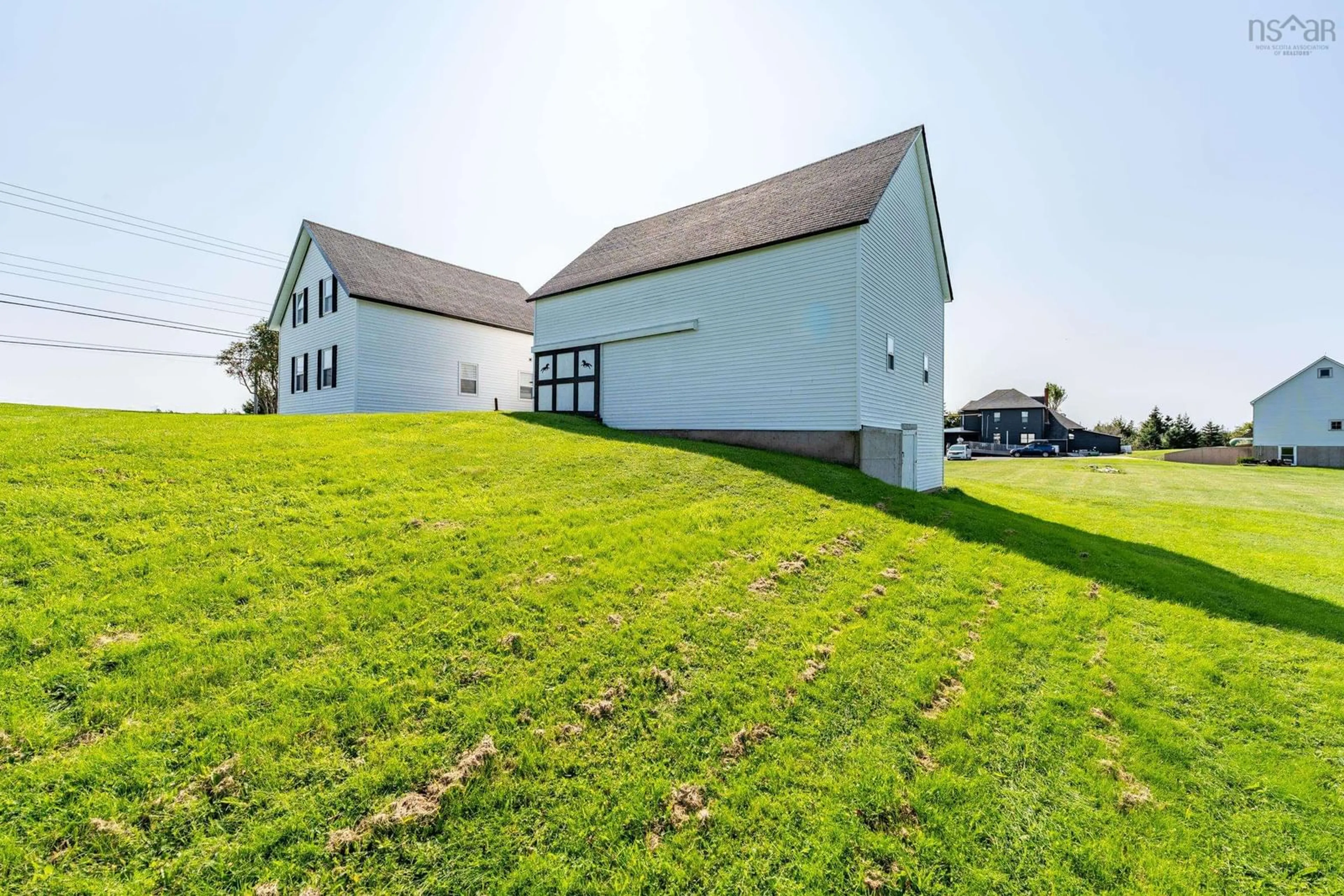 Frontside or backside of a home, the front or back of building for 2857 Evangeline Trail, Grosses Coques Nova Scotia B0W 1M0