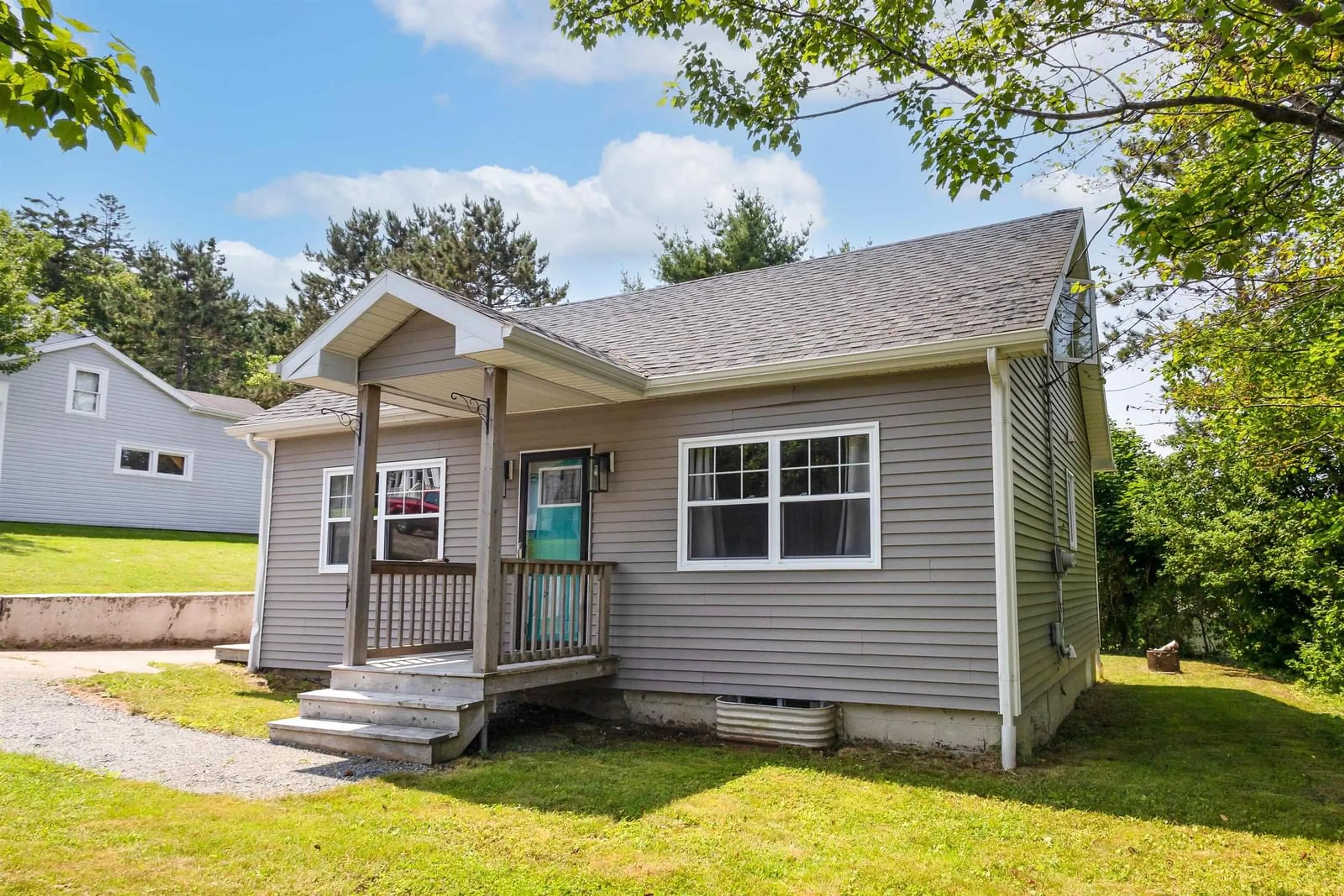 Home with vinyl exterior material for 18 Woodlawn Dr, Sydney River Nova Scotia B1S 1H9