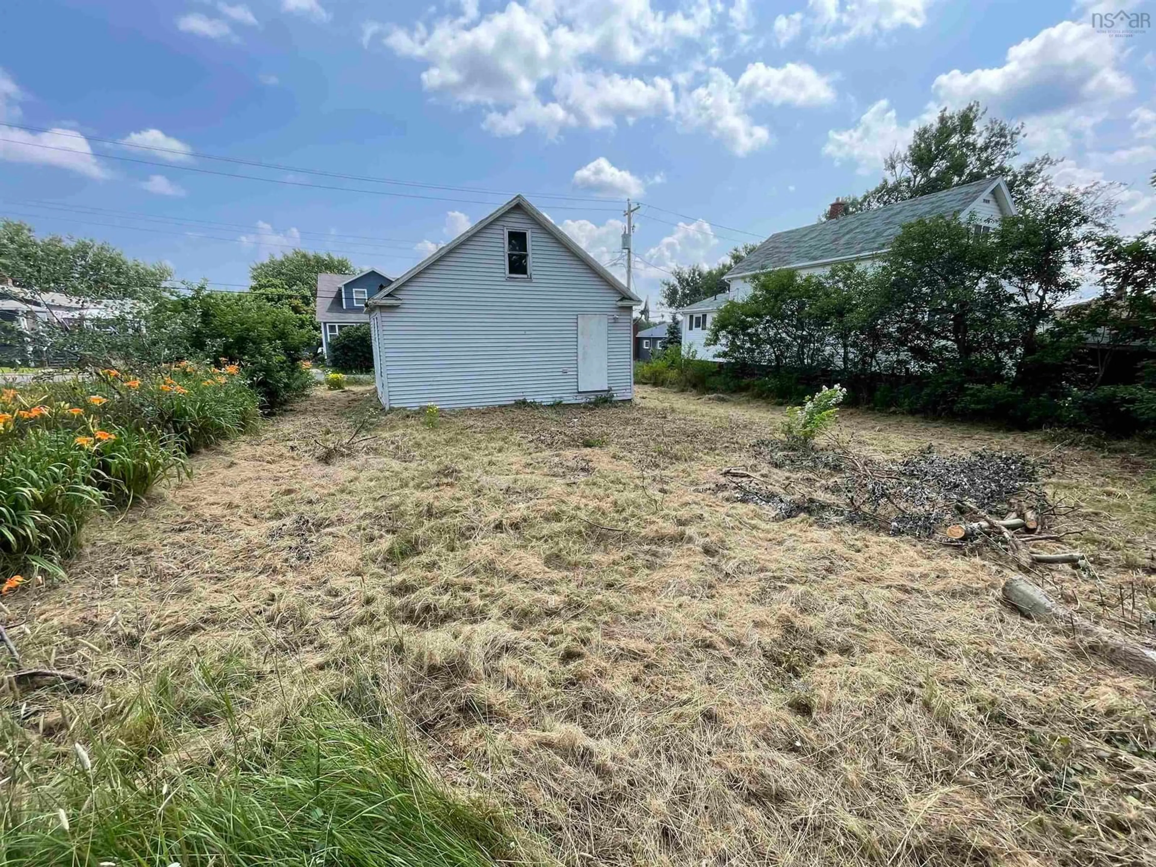 Fenced yard for 285 Curran St, New Waterford Nova Scotia B1H 2Z9