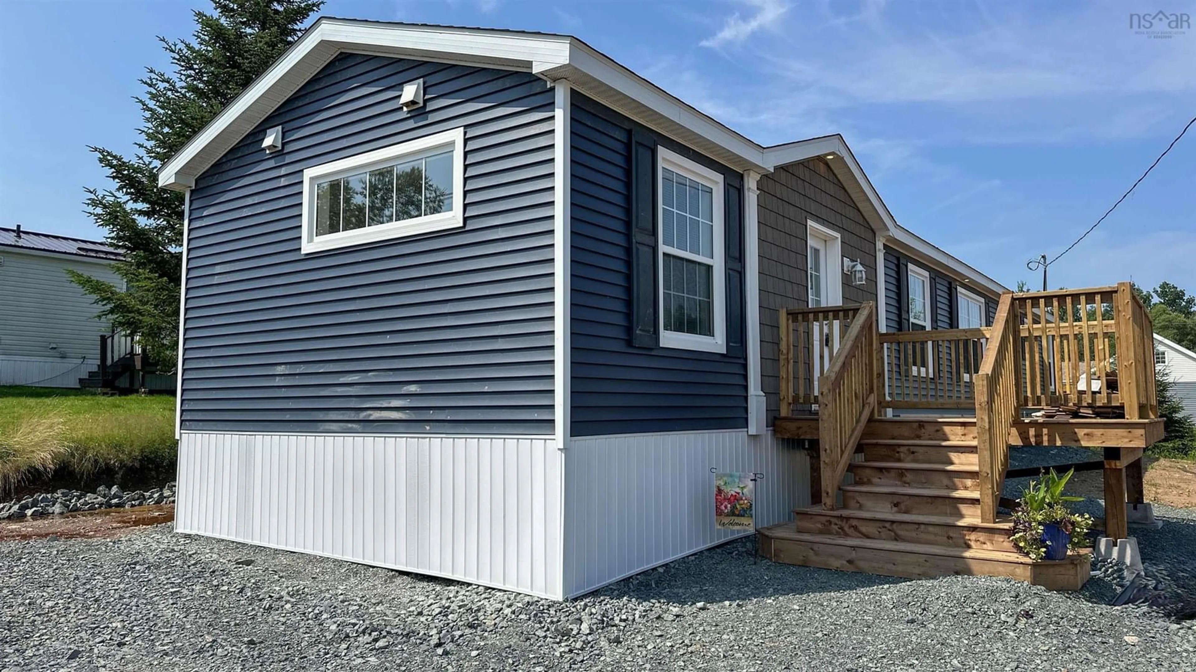 Home with vinyl exterior material for 136 Grosbeak Dr, Salmon River Nova Scotia B2N 5V9