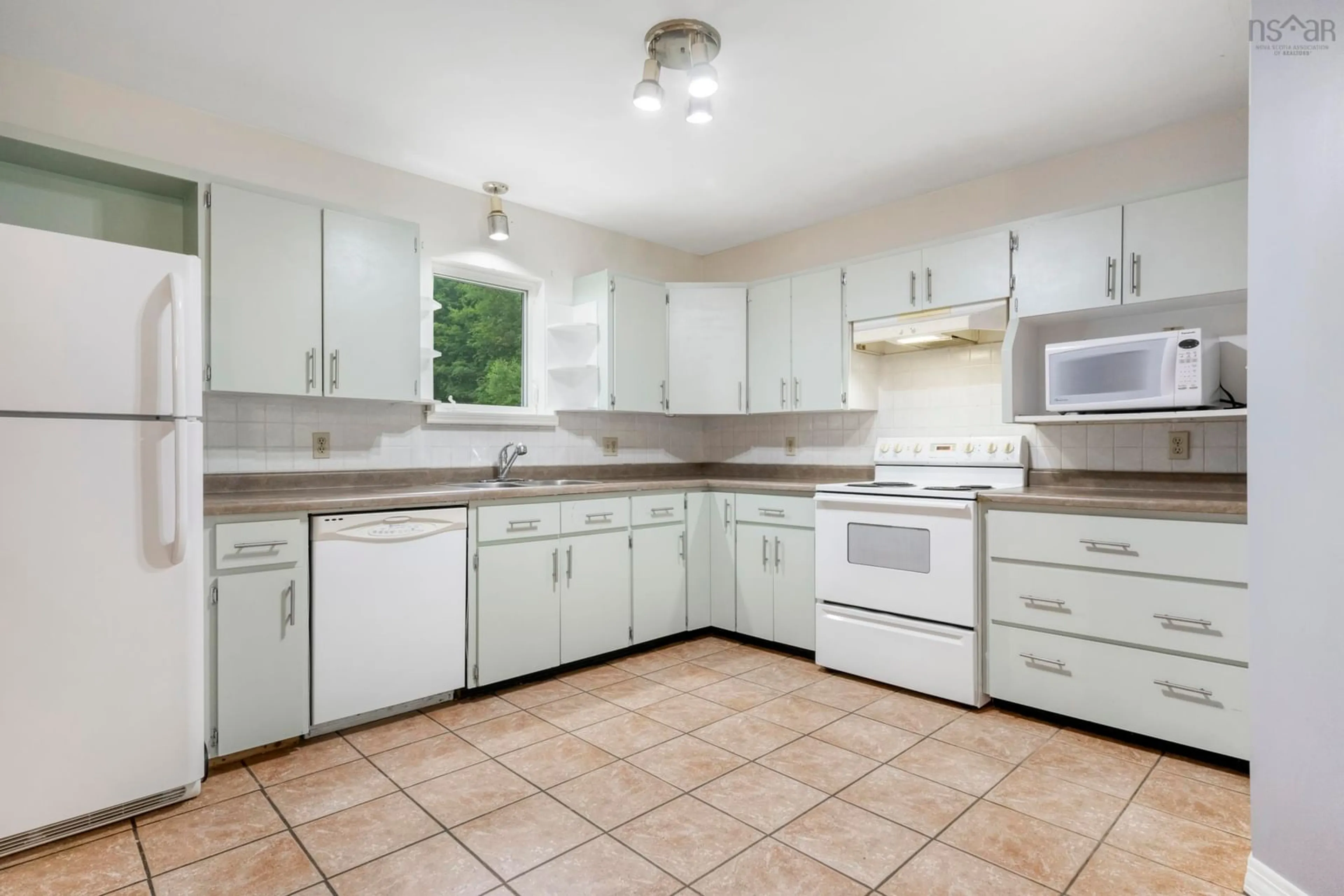 Standard kitchen, wood floors, cottage for 63 Corkum Dr, Chester Basin Nova Scotia B0J 1K0