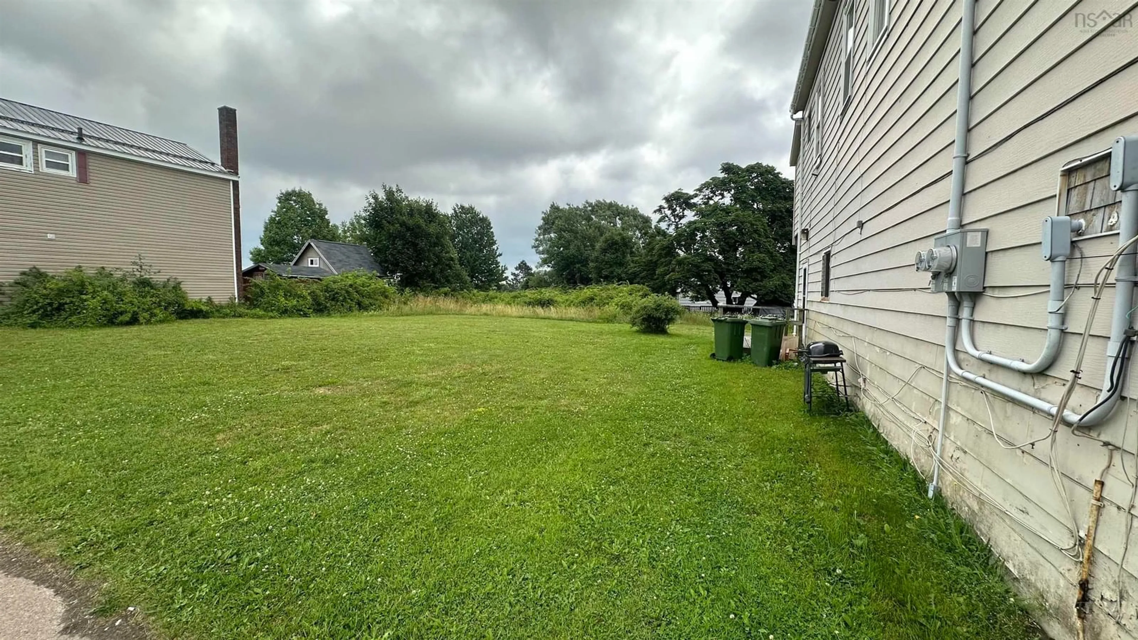 Patio, the fenced backyard for 1795-97, 2 Lots Main St, Westville Nova Scotia B0K 2A0