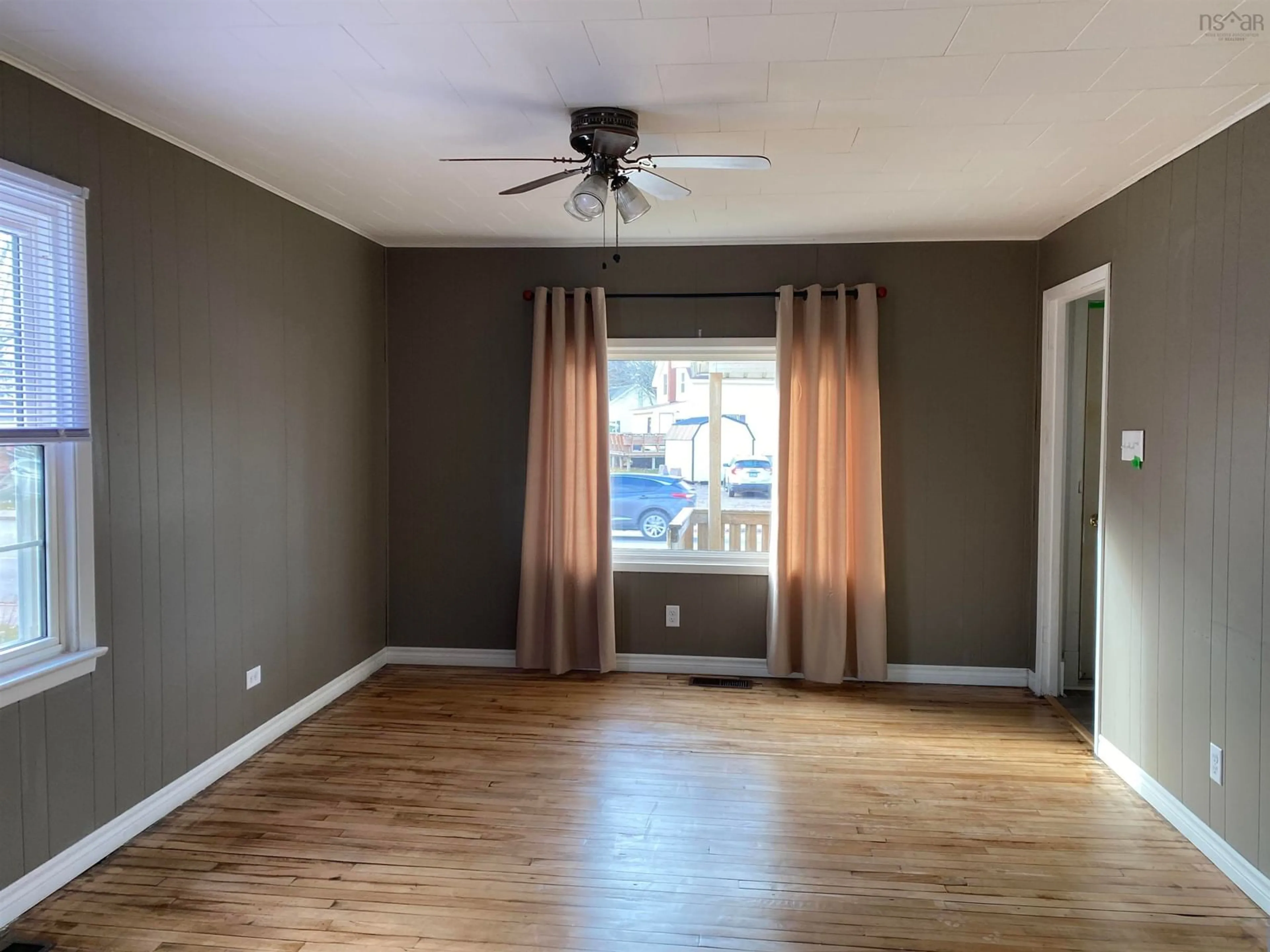 A pic of a room, wood floors for 82 South Albion St, Amherst Nova Scotia B4H 2W9