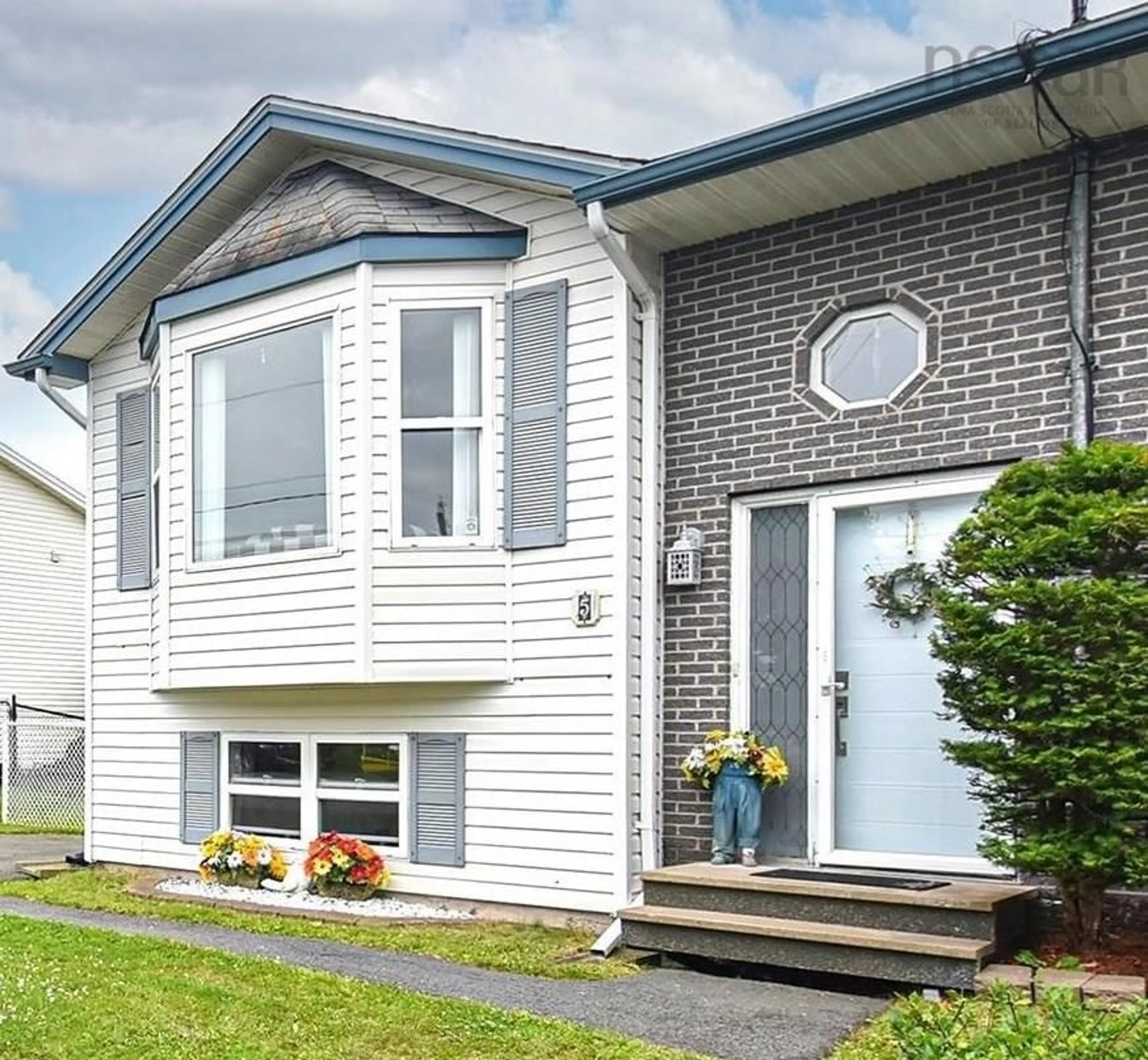 Home with vinyl exterior material for 5 Kohar Crt, Eastern Passage Nova Scotia B3G 1N6