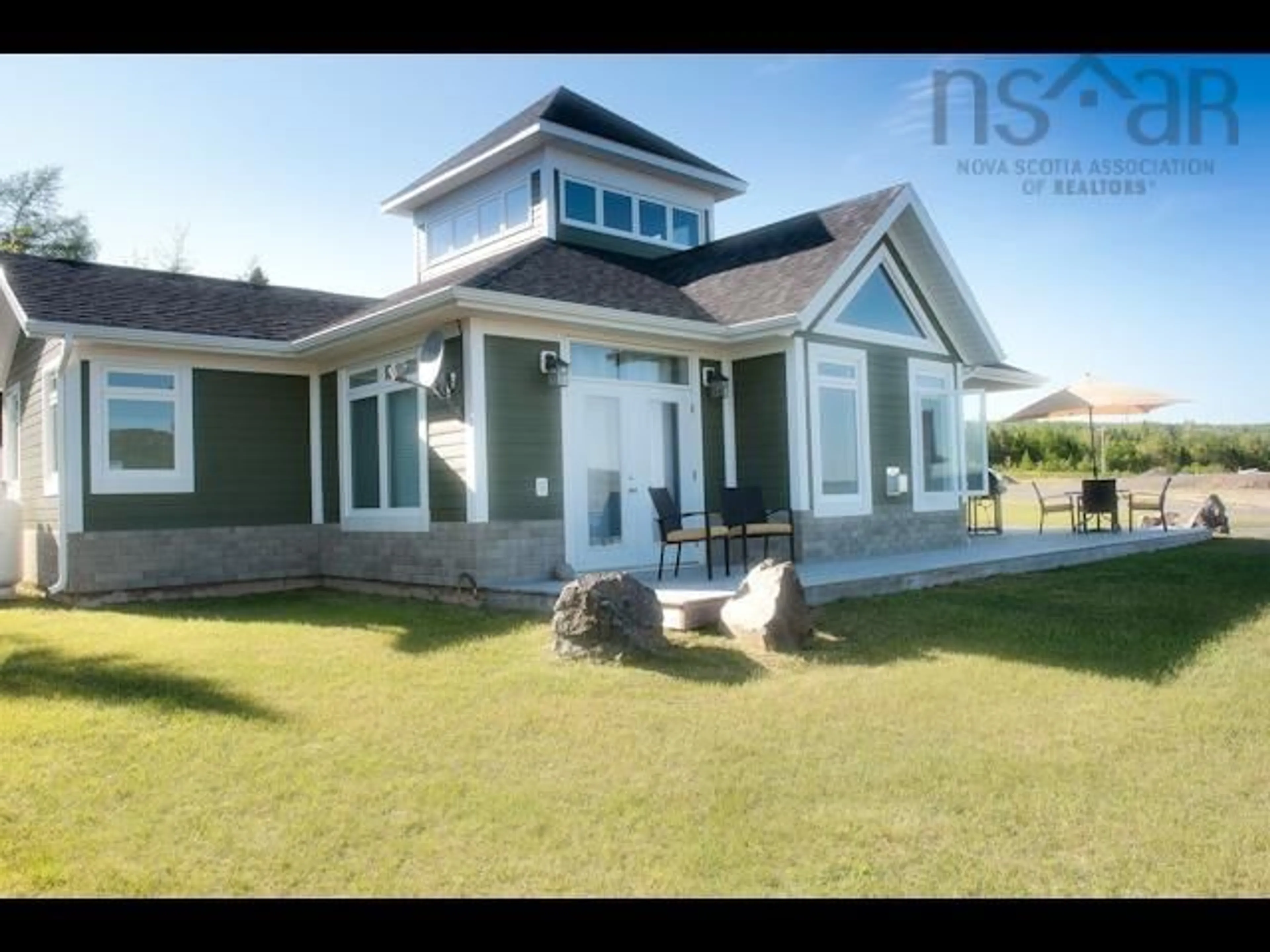 Frontside or backside of a home for 17 Bell Bay Way, Baddeck Bay Nova Scotia B0E 1B0