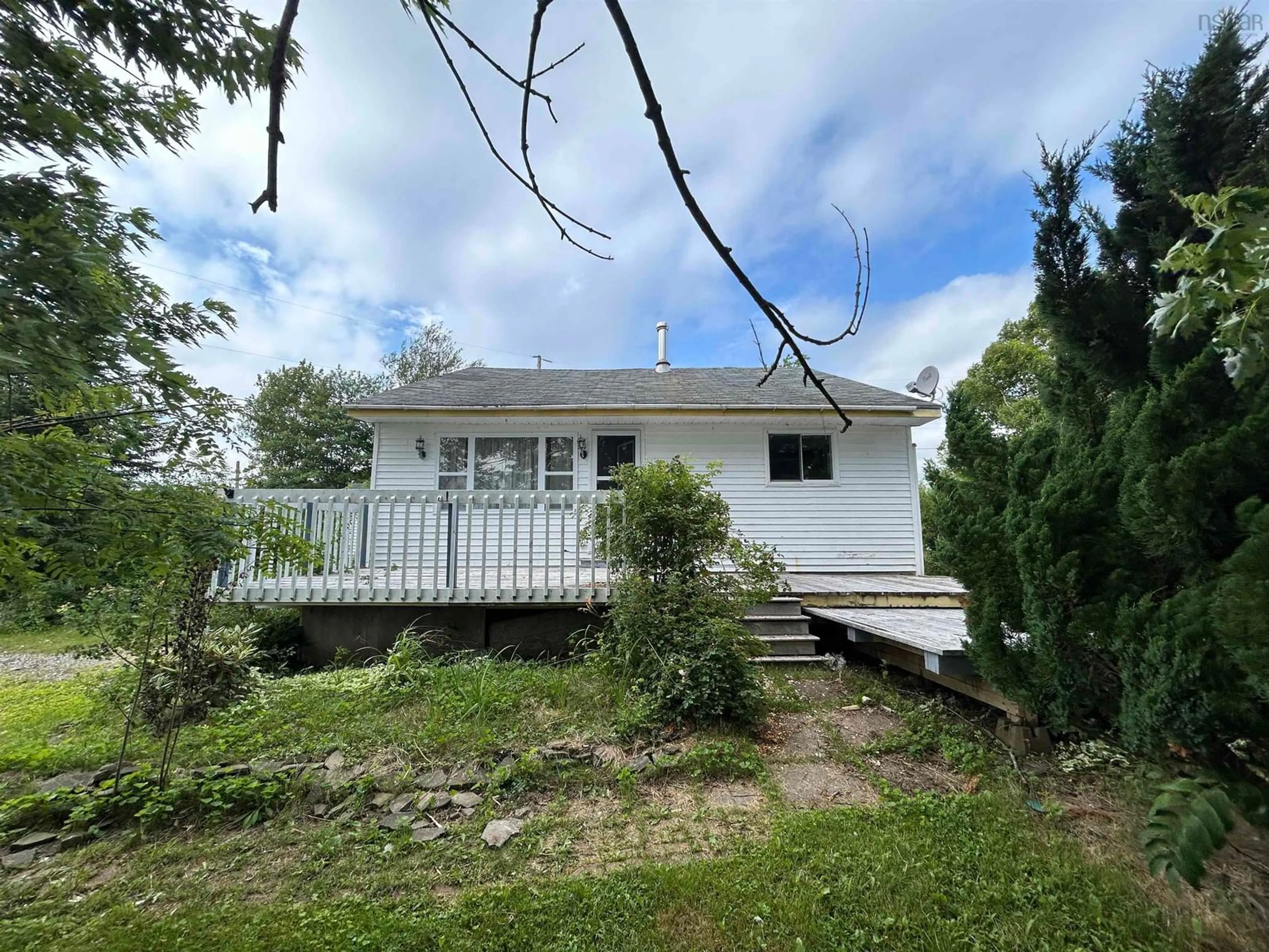 Frontside or backside of a home for 1936 Hillside Rd, Marion Bridge Nova Scotia B1P 1C5