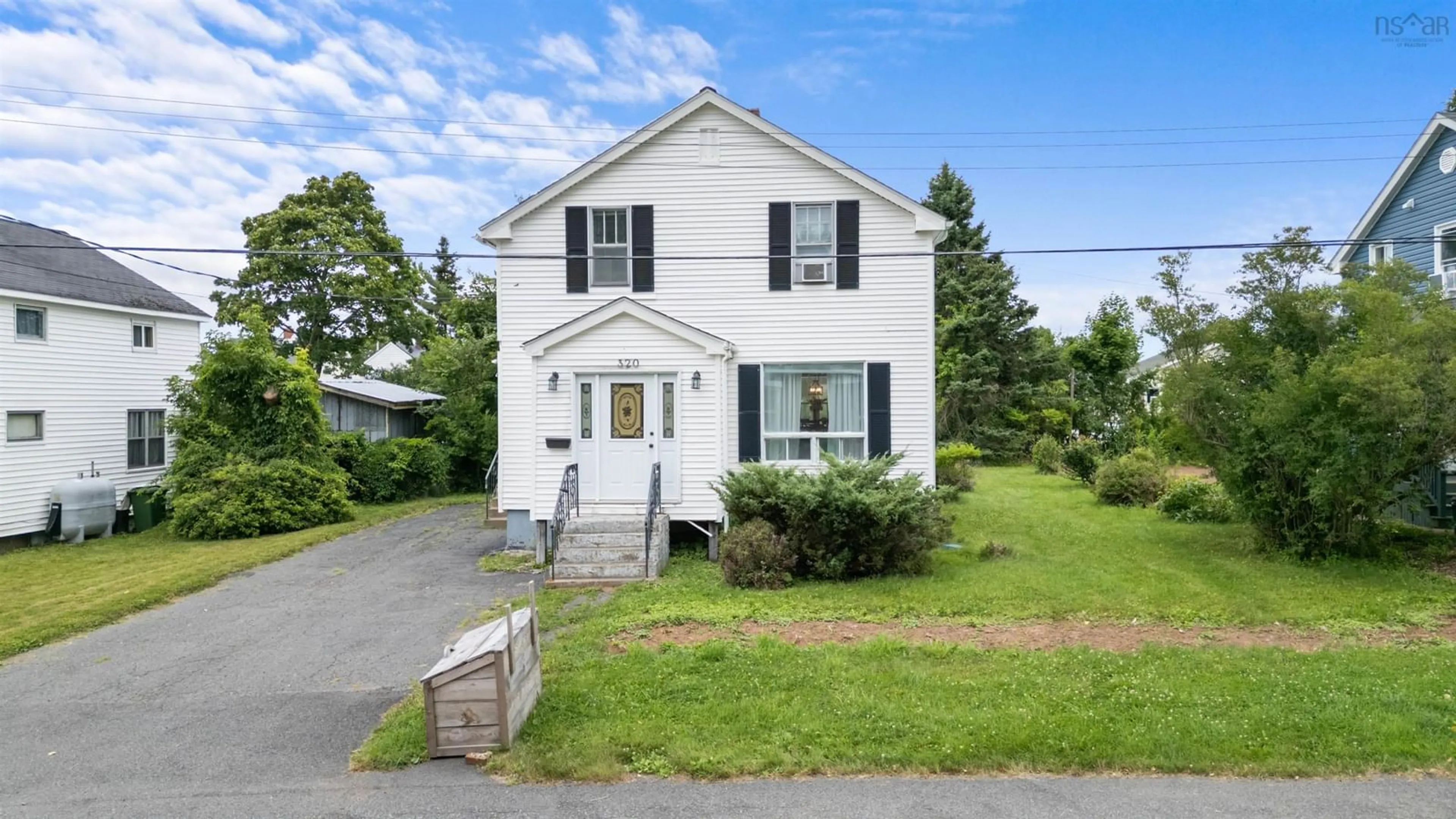 Frontside or backside of a home for 320 Cottage St, New Glasgow Nova Scotia B2H 4G1