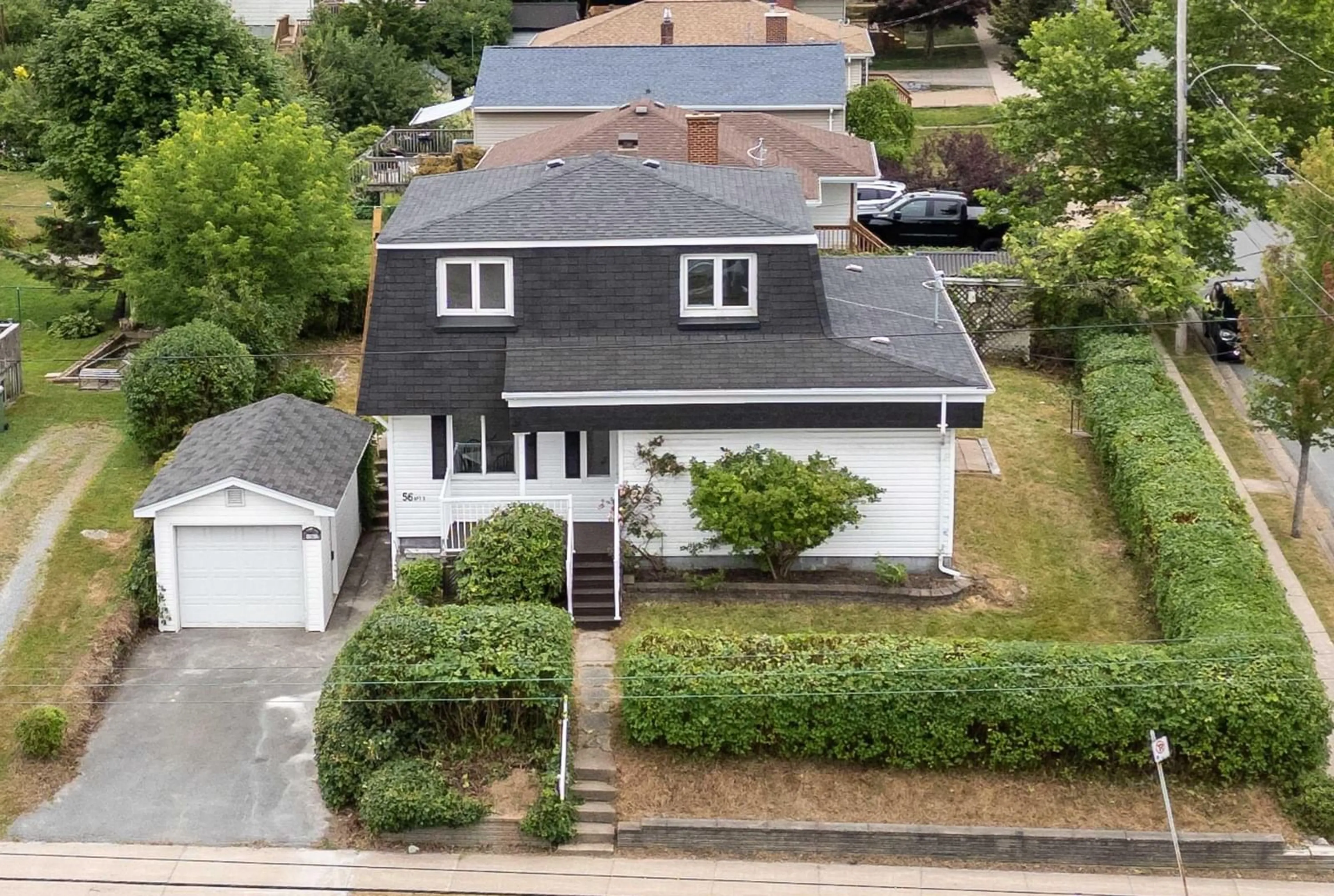 Frontside or backside of a home for 56 Woodland Ave, Dartmouth Nova Scotia B3A 3K1