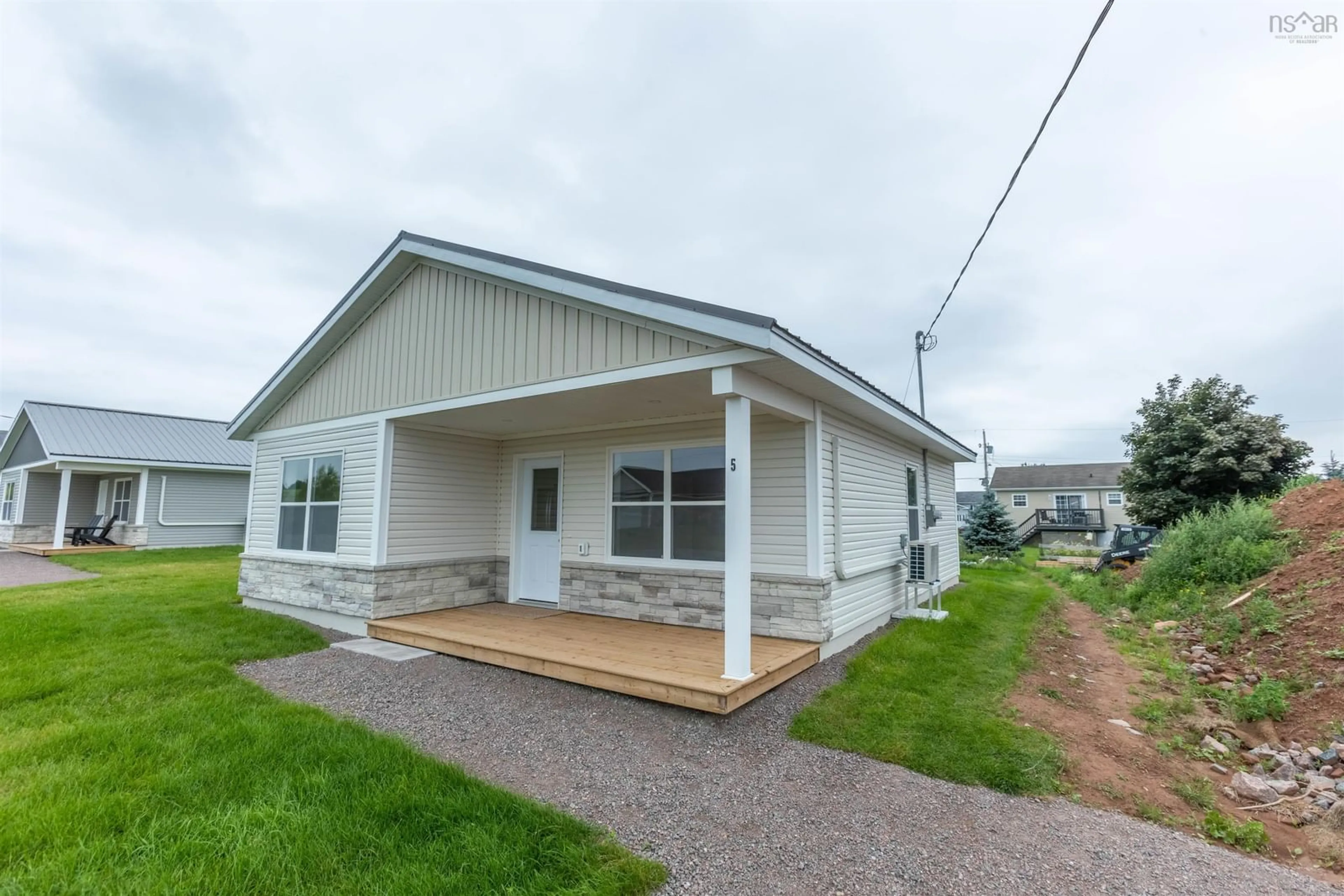 Home with vinyl exterior material for 5 Fleming St, Amherst Nova Scotia B4H 0C3