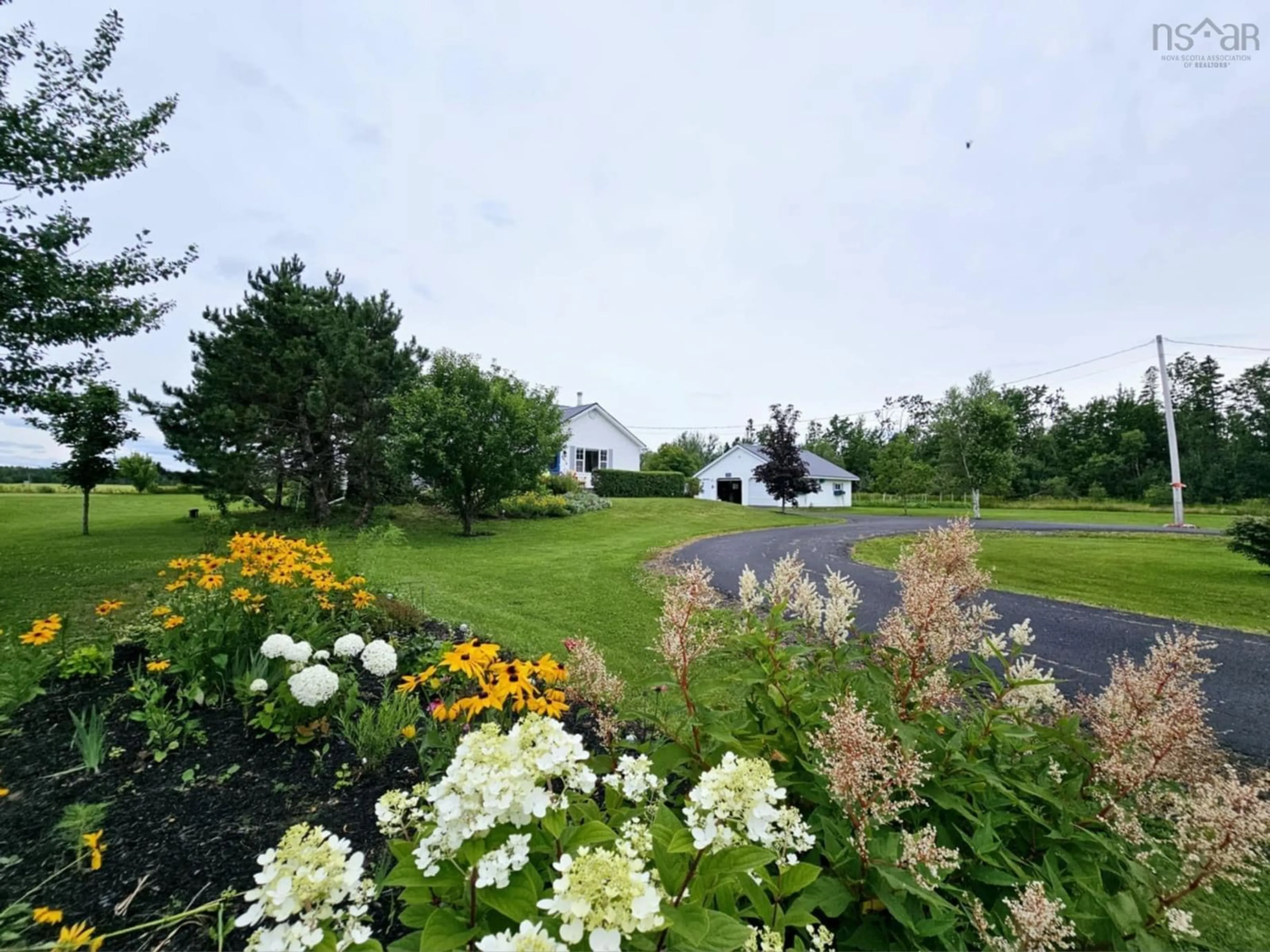 A pic from exterior of the house or condo, the fenced backyard for 4474 Highway 6, Brule Nova Scotia B0K 1N0